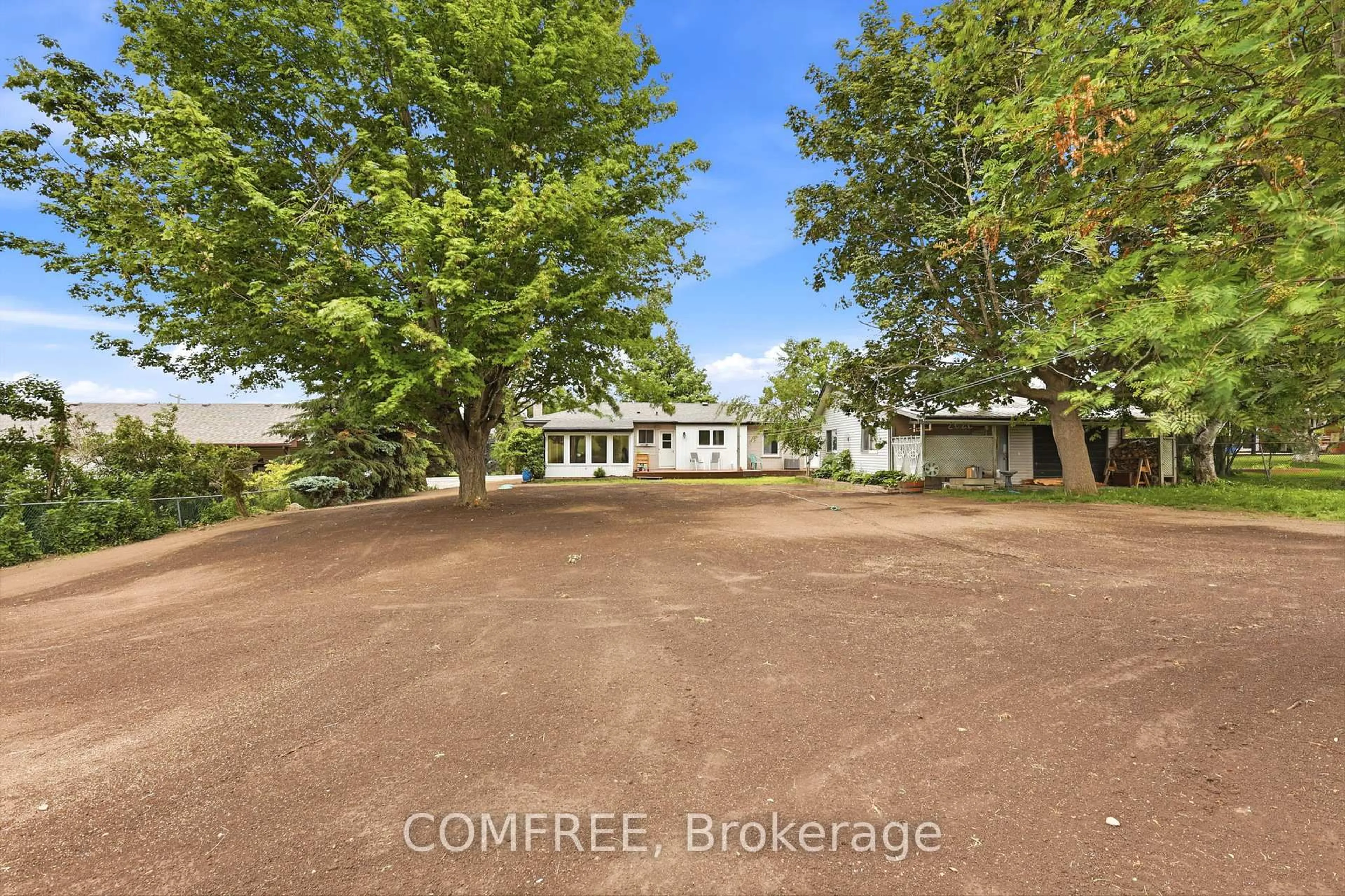A pic from outside/outdoor area/front of a property/back of a property/a pic from drone, street for 1408 Yankee Line, Selwyn Ontario K0L 1T0