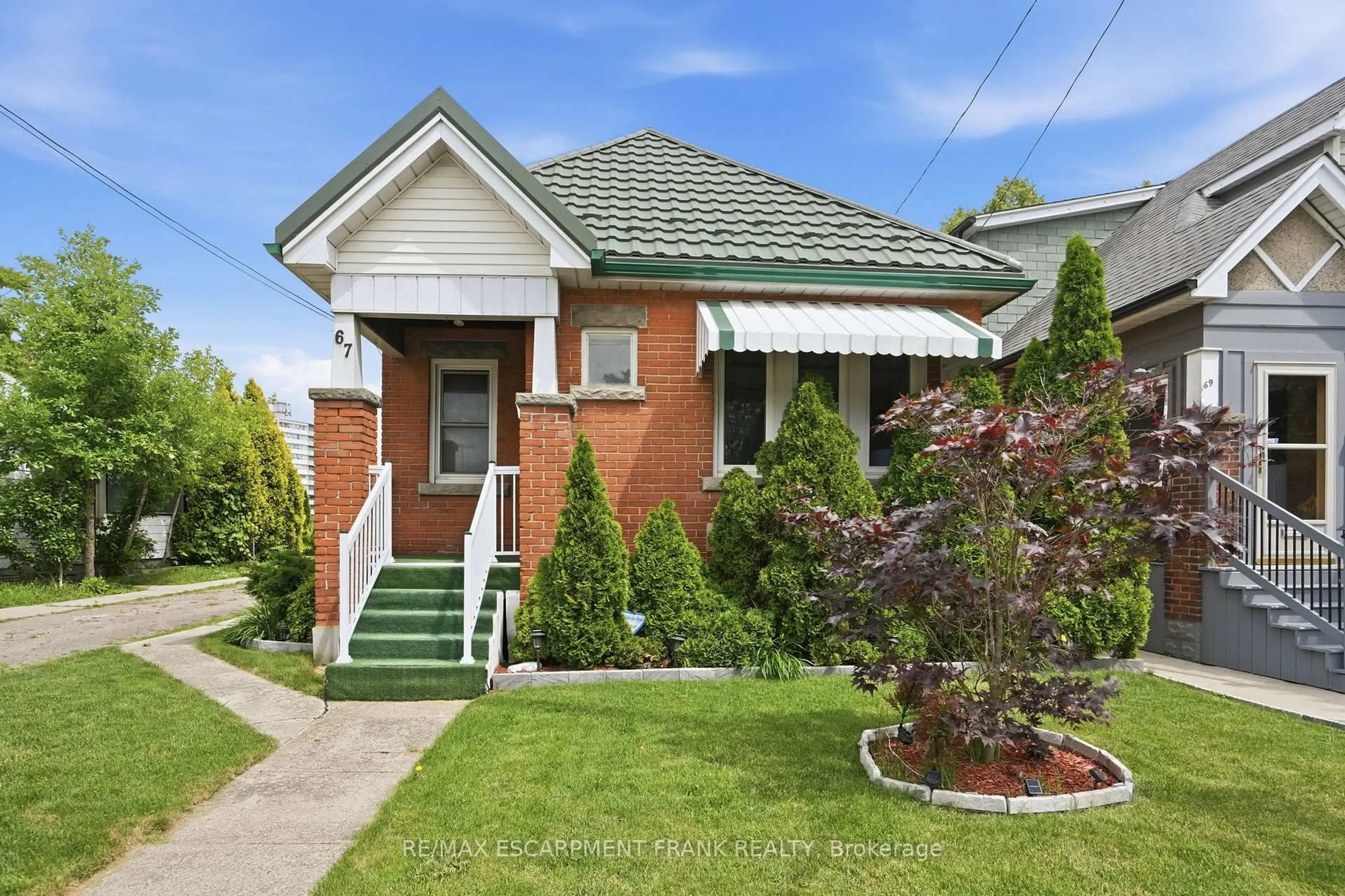 Home with brick exterior material, street for 67 Paradise Rd, Hamilton Ontario L8S 1S3
