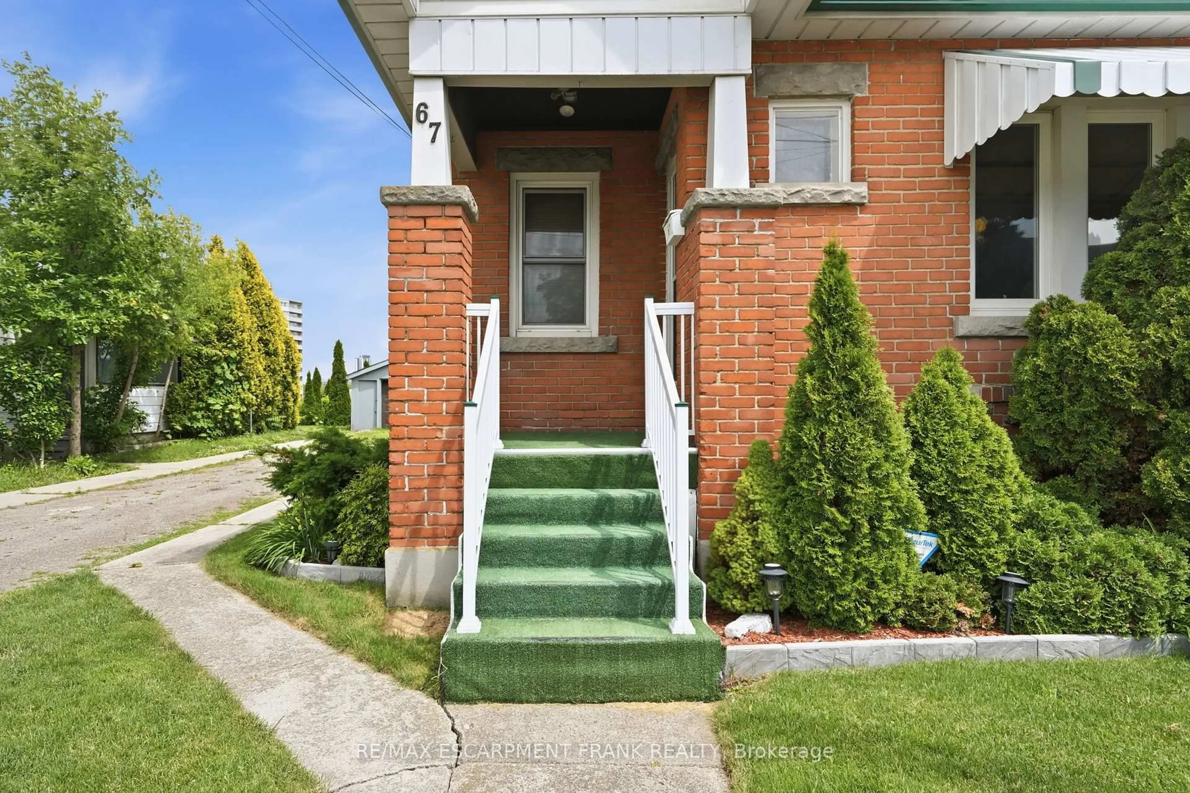 Home with brick exterior material, street for 67 Paradise Rd, Hamilton Ontario L8S 1S3