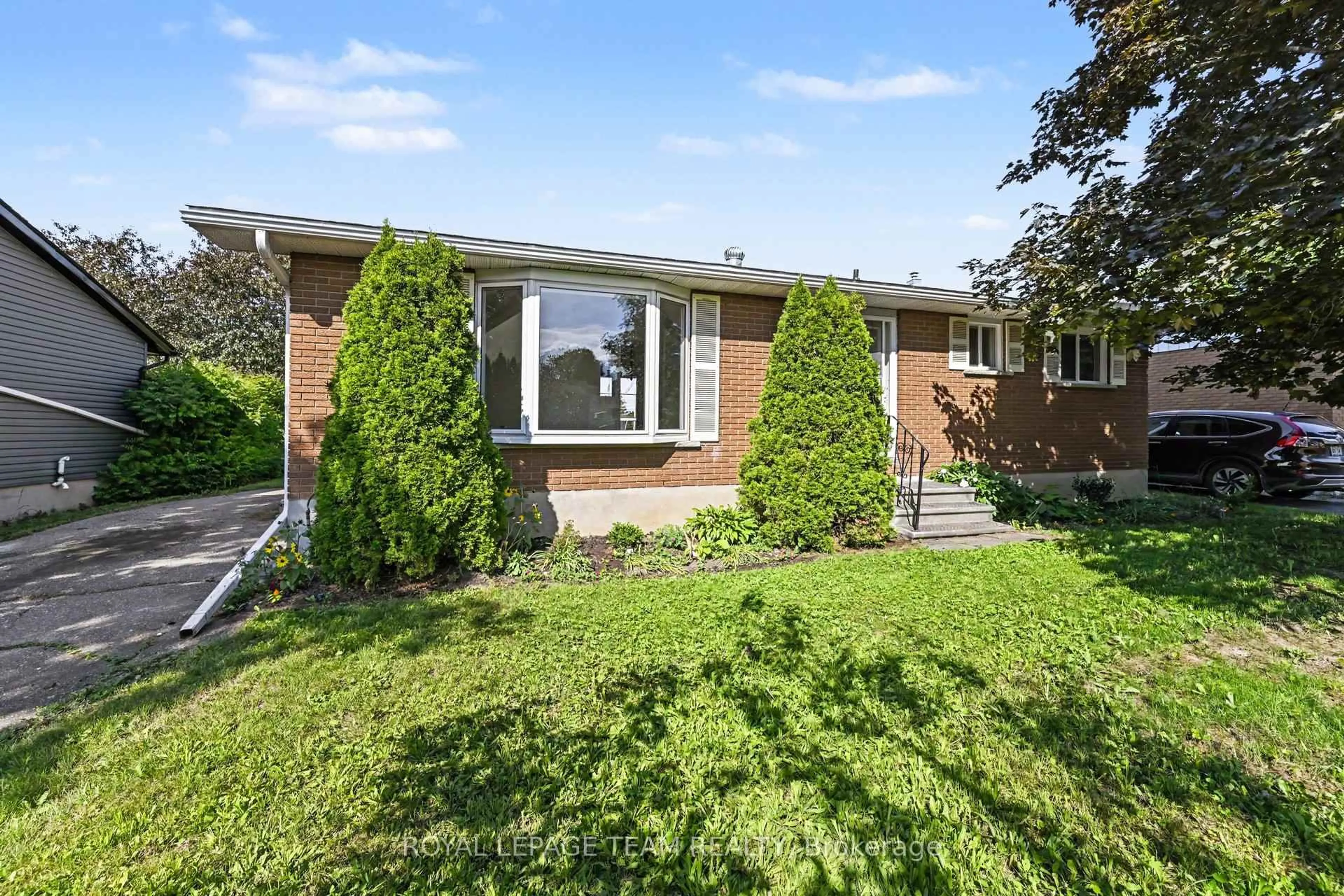Home with brick exterior material, street for 855 Kedrosky Dr, Renfrew Ontario K7V 4C8