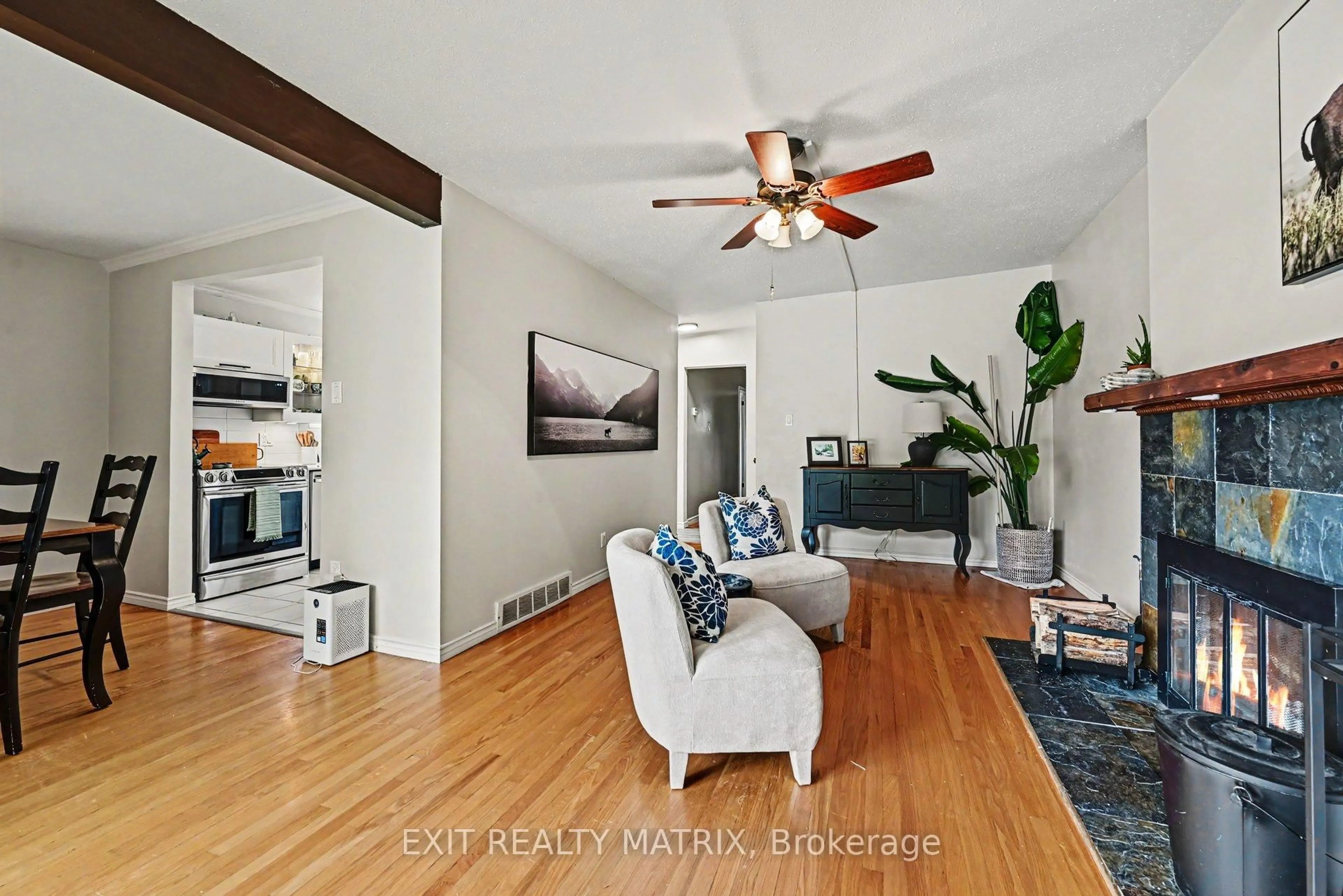 Living room with furniture, wood/laminate floor for 2385 Walkley Rd, Ottawa Ontario K1H 2H1