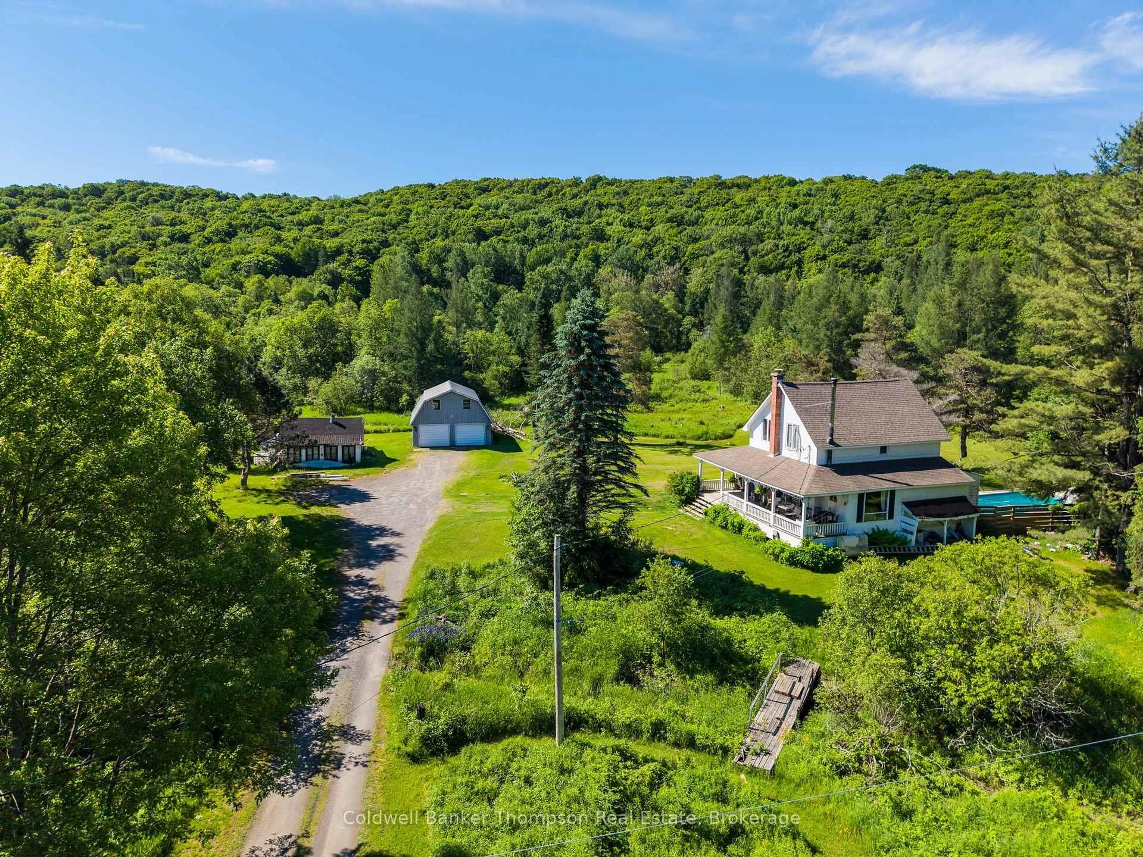 A pic from outside/outdoor area/front of a property/back of a property/a pic from drone, mountain view for 421 Lindgren Rd, Huntsville Ontario P1H 1Y6