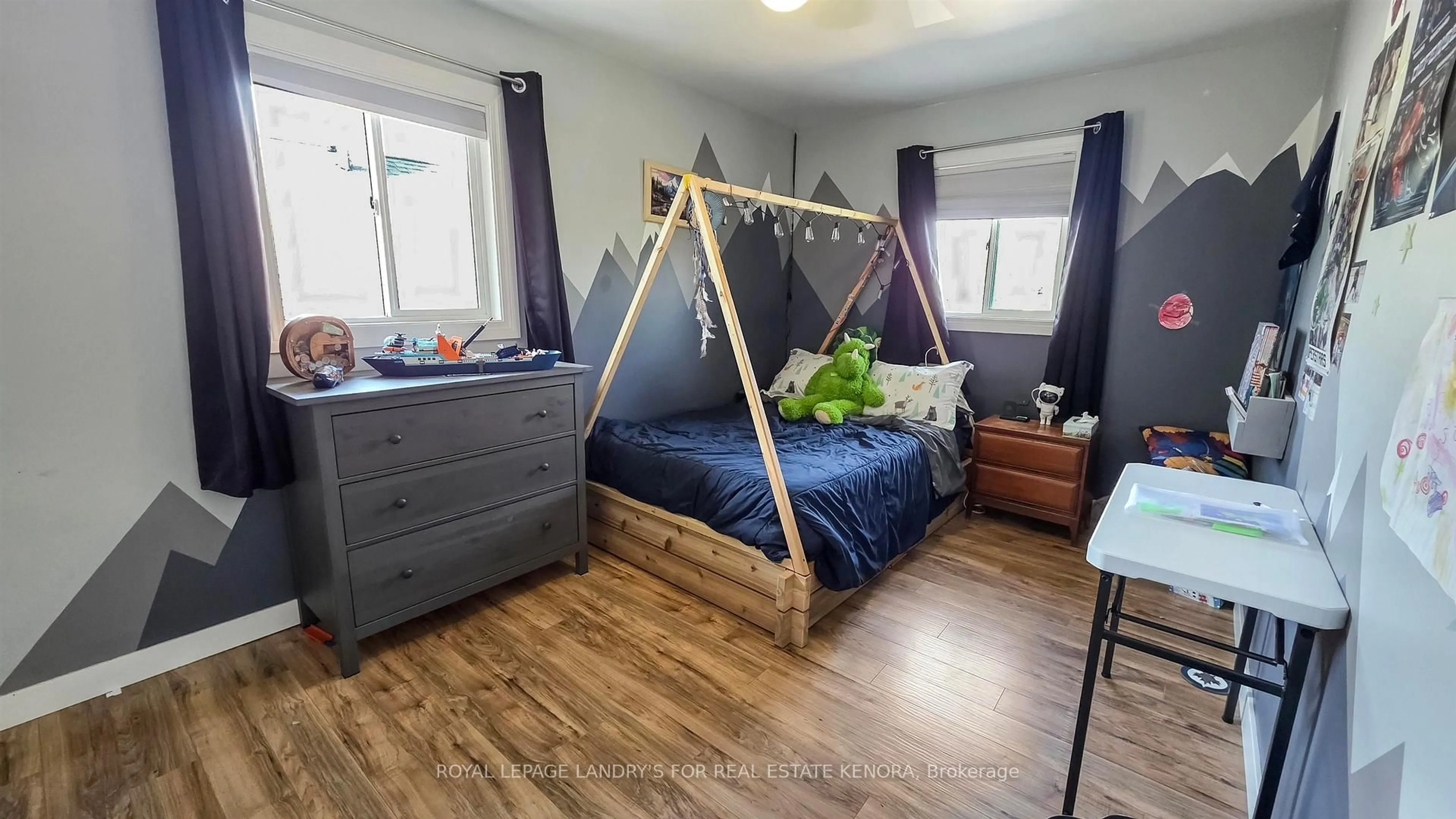 Bedroom with bed, wood/laminate floor for 912 Ninth St, Kenora Ontario P9N 2T2