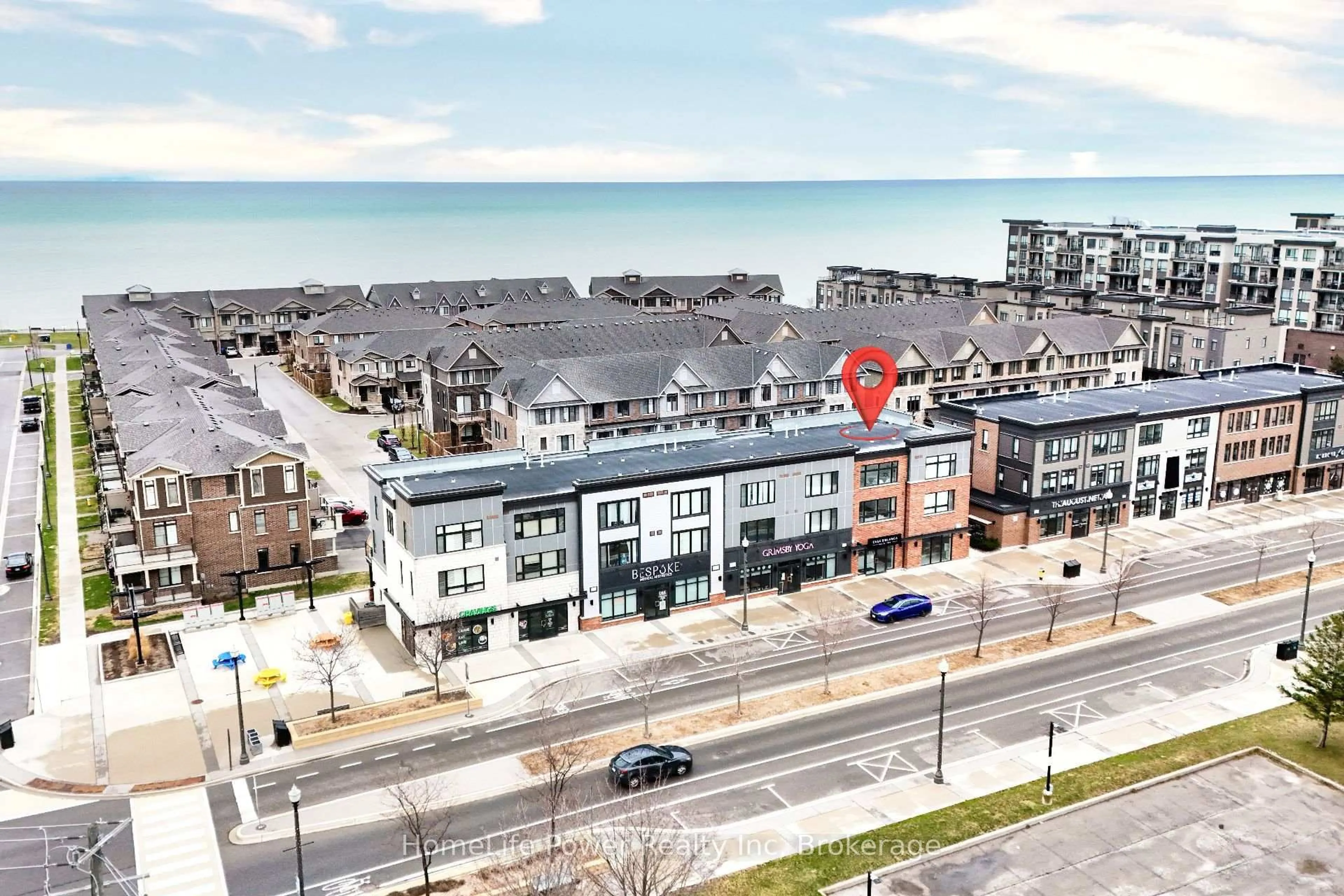 A pic from outside/outdoor area/front of a property/back of a property/a pic from drone, city buildings view from balcony for 79 Esplanade Lane, Grimsby Ontario L3M 0H2