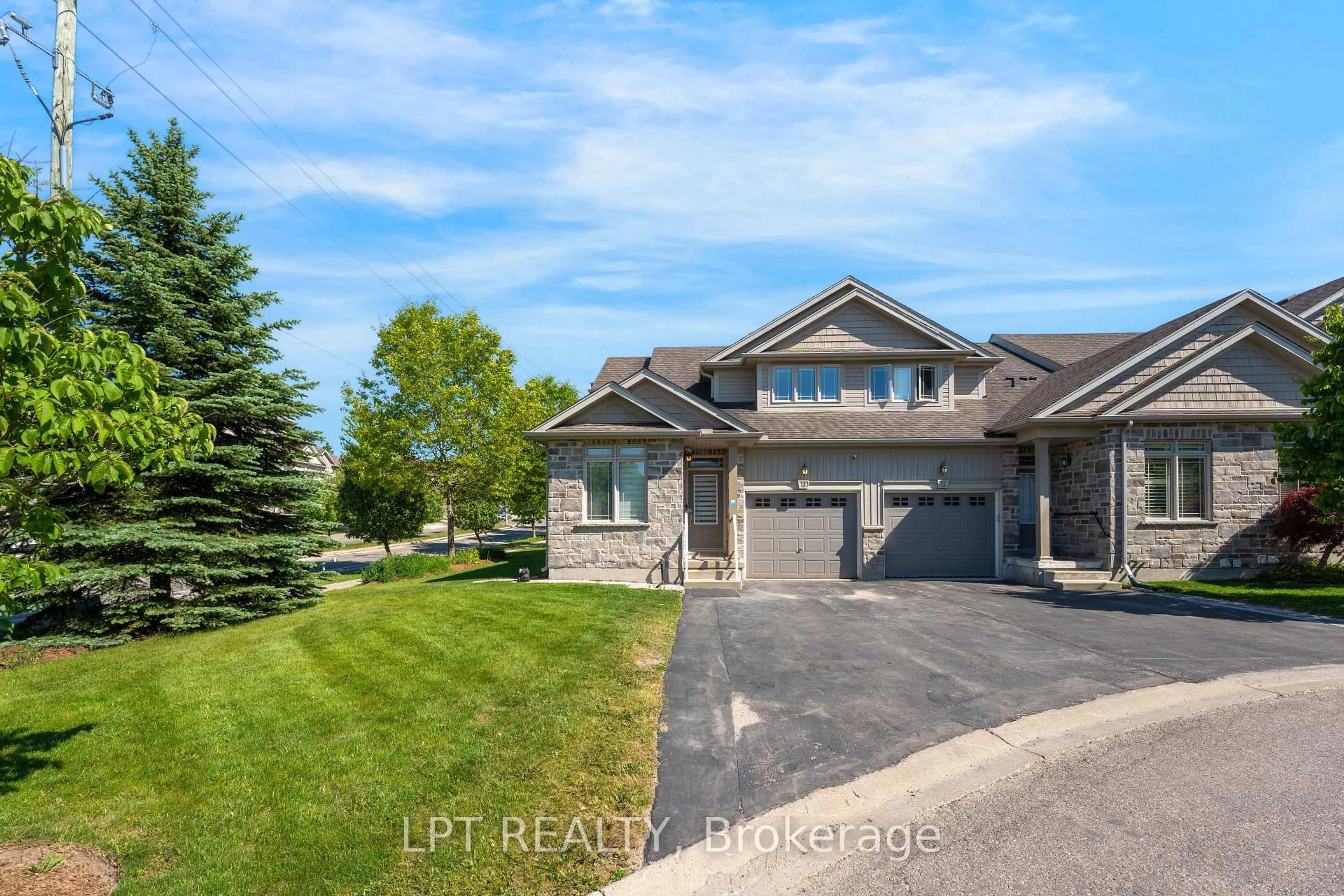A pic from outside/outdoor area/front of a property/back of a property/a pic from drone, street for 795 Laurelwood Dr #13, Waterloo Ontario N2V 0A3