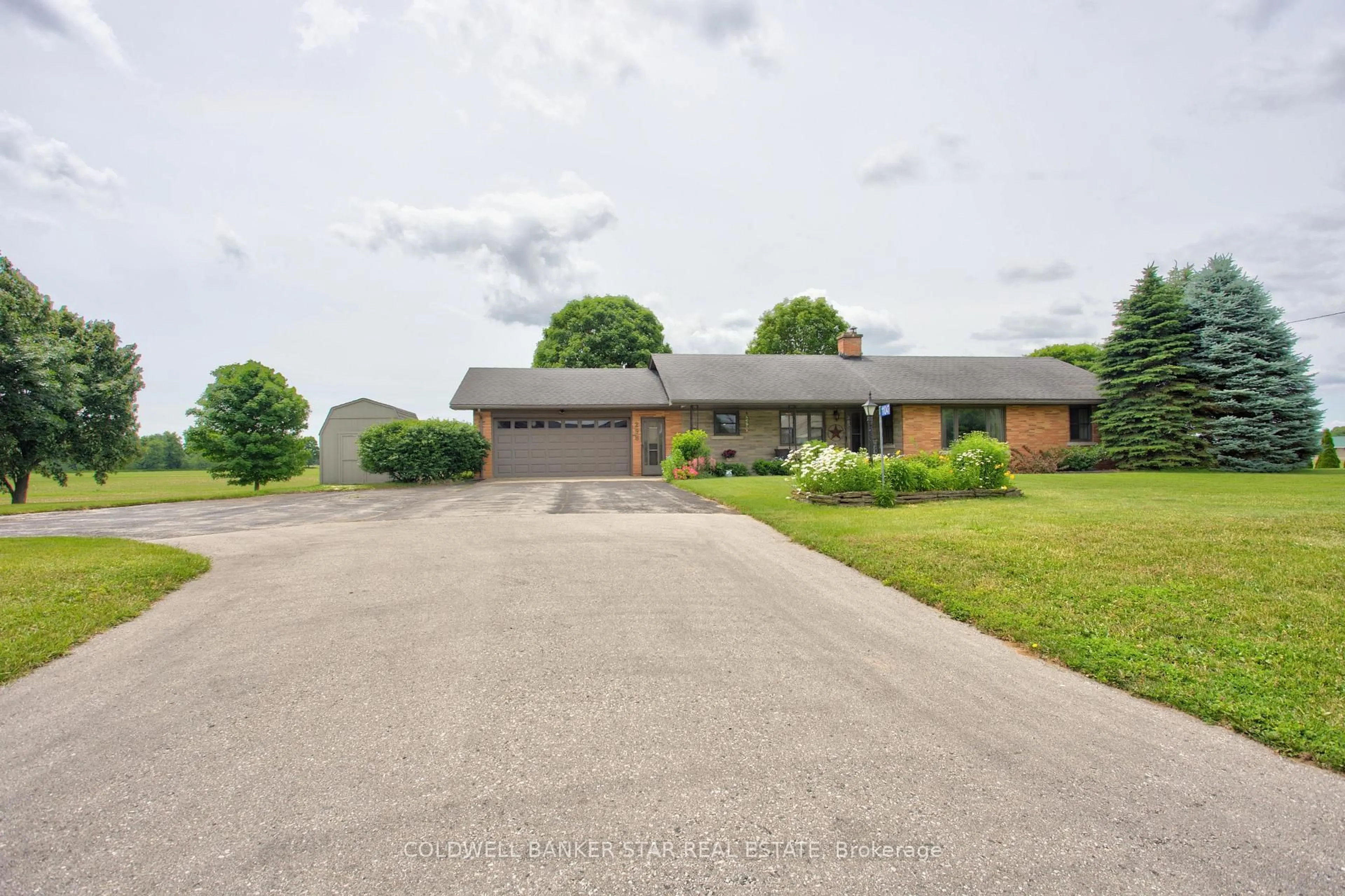 A pic from outside/outdoor area/front of a property/back of a property/a pic from drone, street for 11047 Miller Rd, Dutton/Dunwich Ontario N0L 1J0