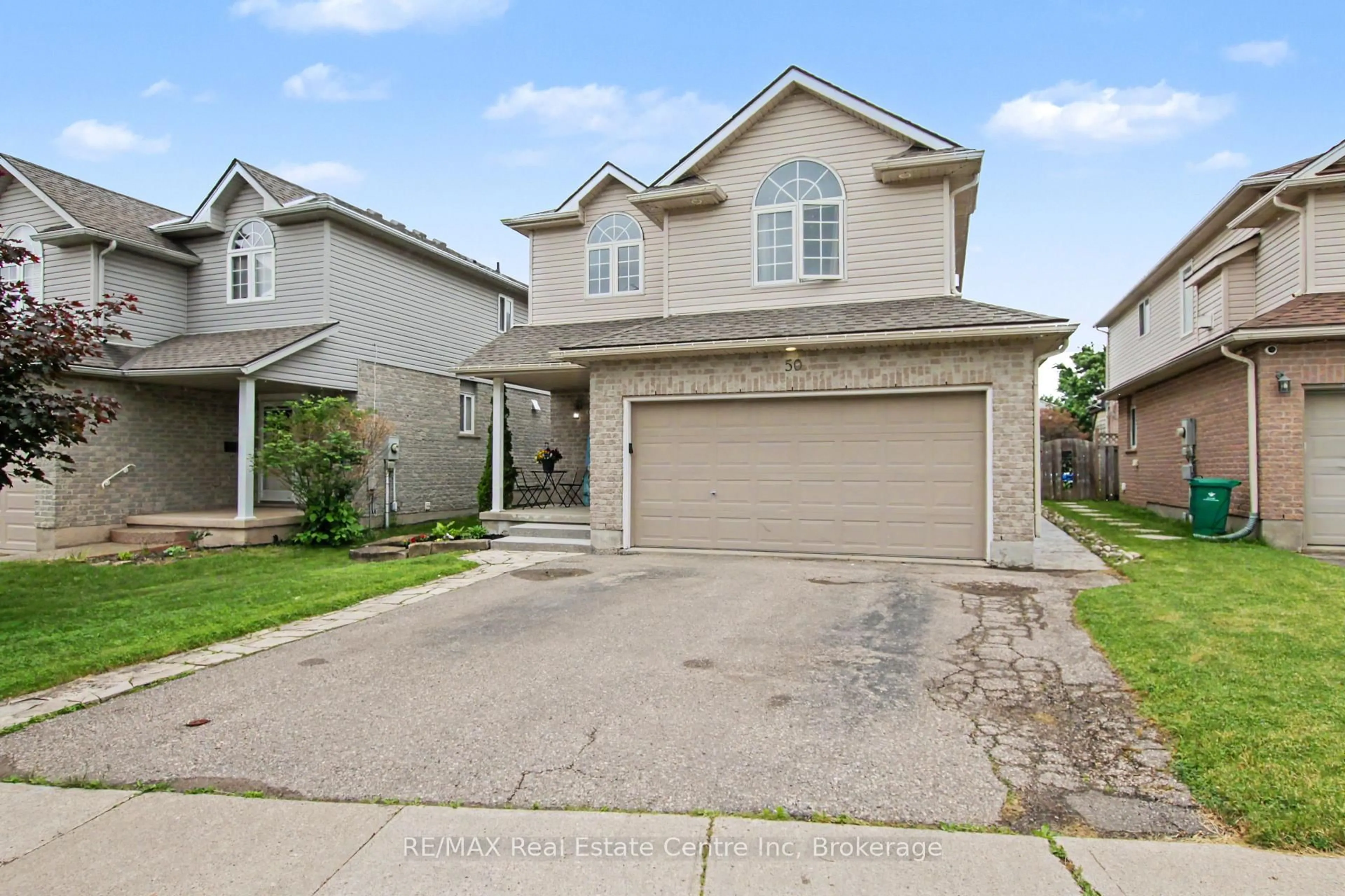 Home with vinyl exterior material, street for 50 Forler St, Wilmot Ontario N3A 2L3