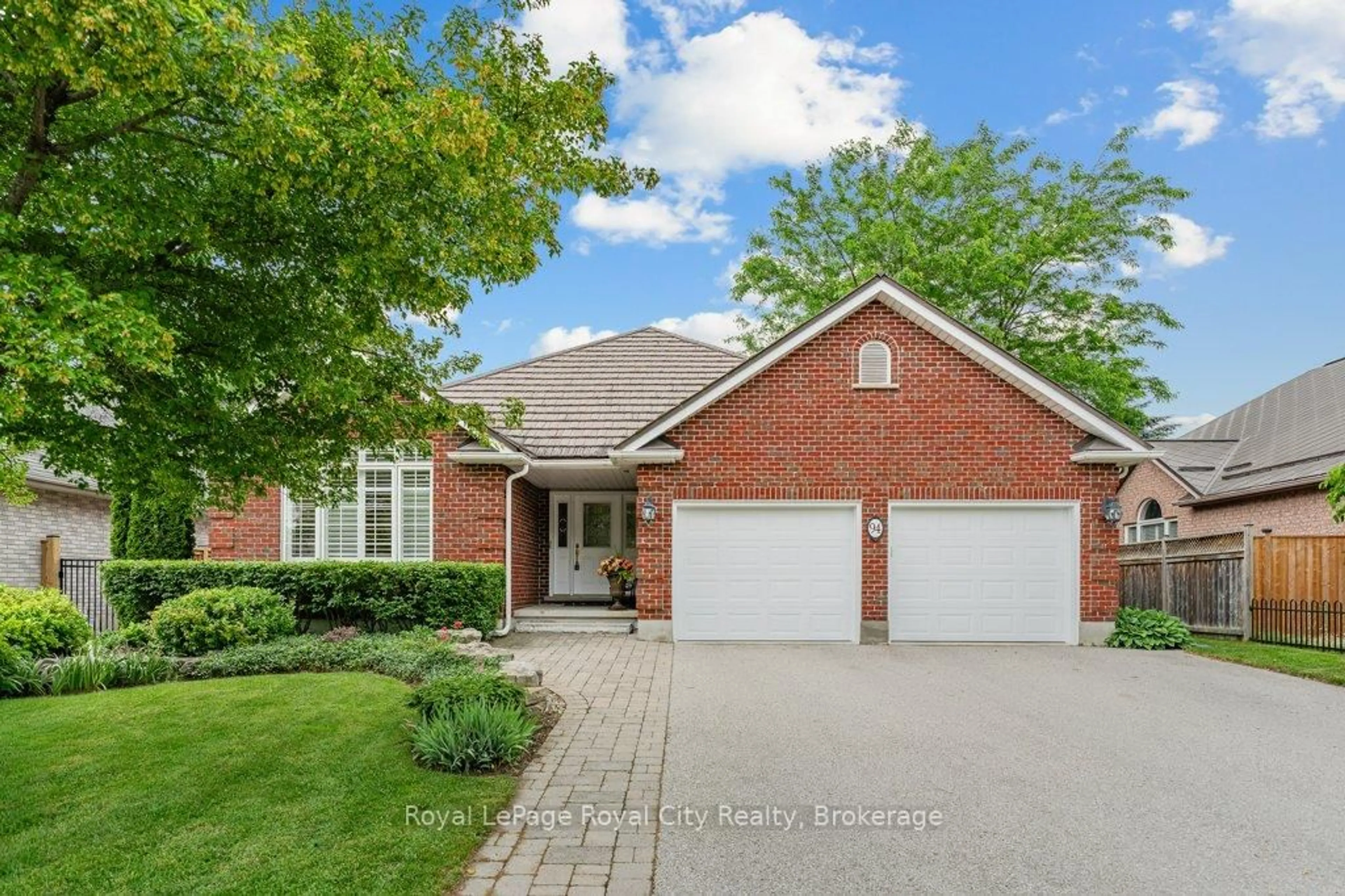 Home with brick exterior material, street for 94 Kortright Rd, Guelph Ontario N1G 4C5