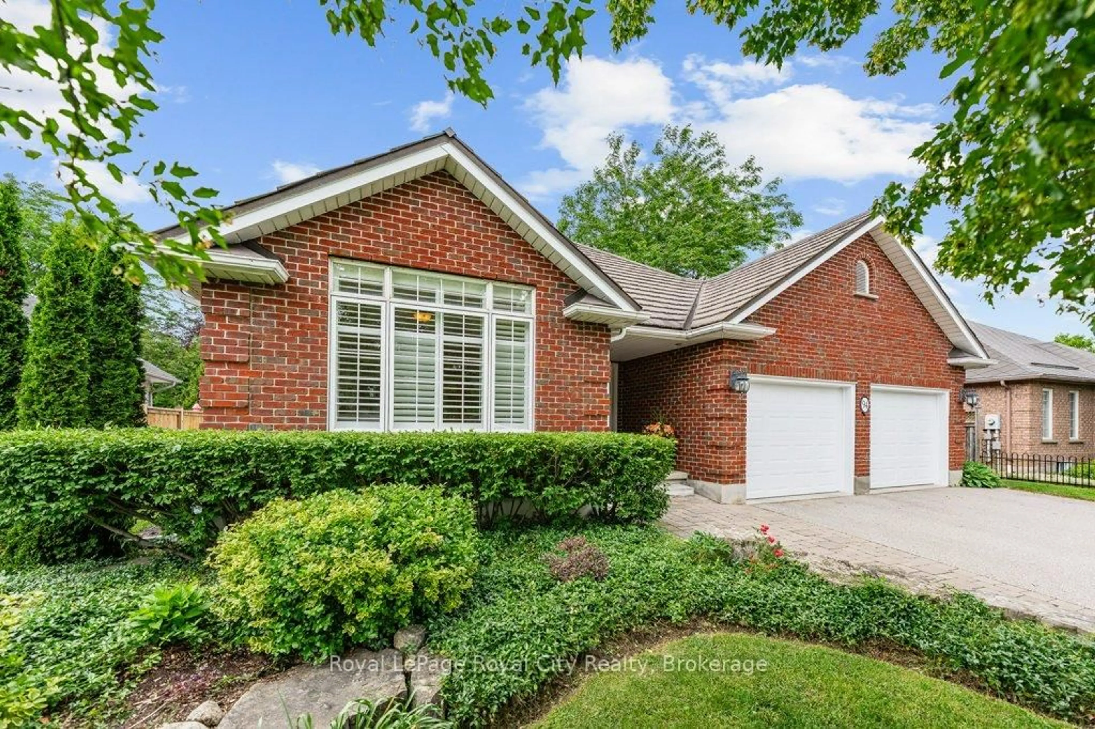 Home with brick exterior material, street for 94 Kortright Rd, Guelph Ontario N1G 4C5