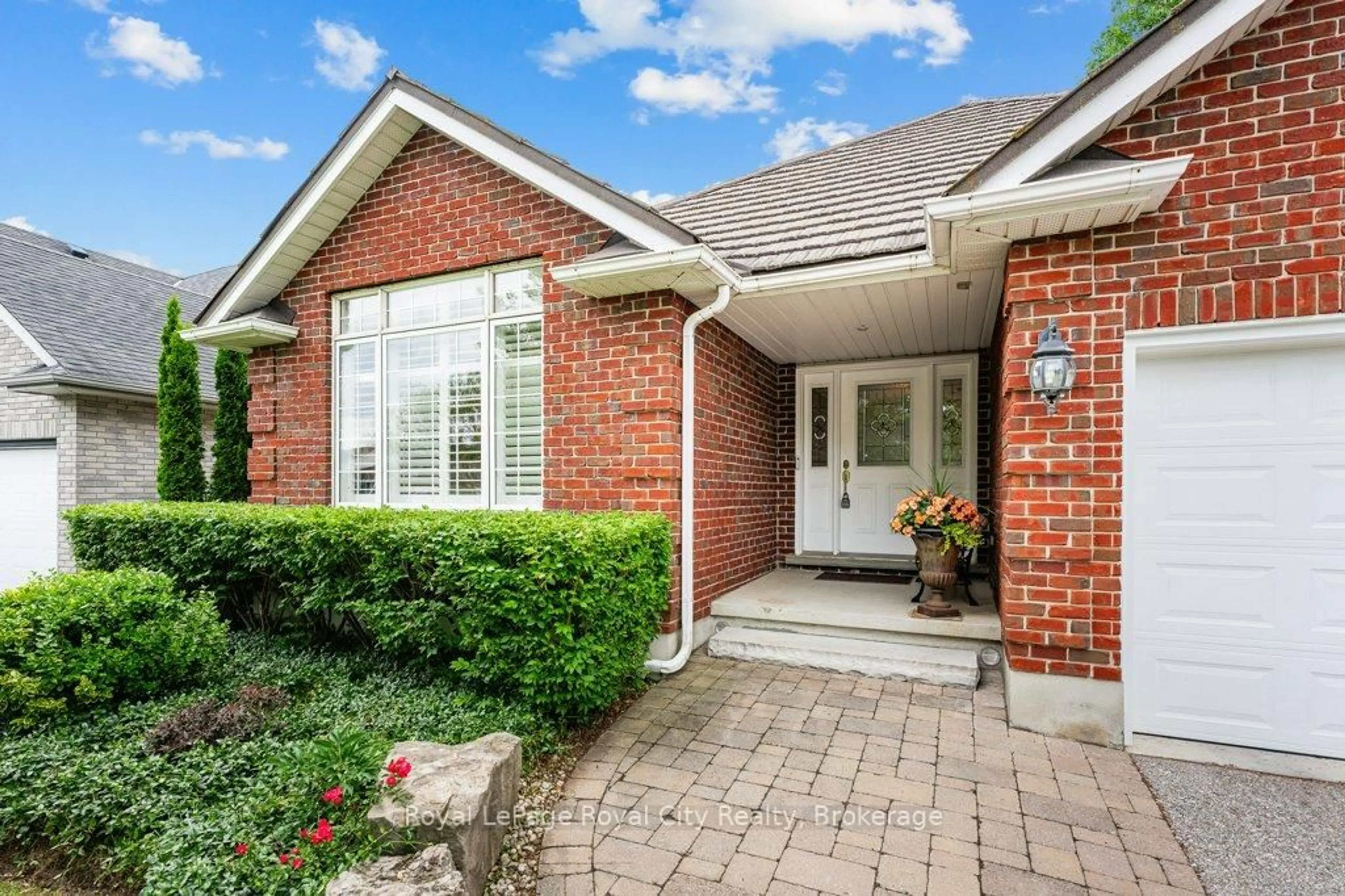 Home with brick exterior material, street for 94 Kortright Rd, Guelph Ontario N1G 4C5