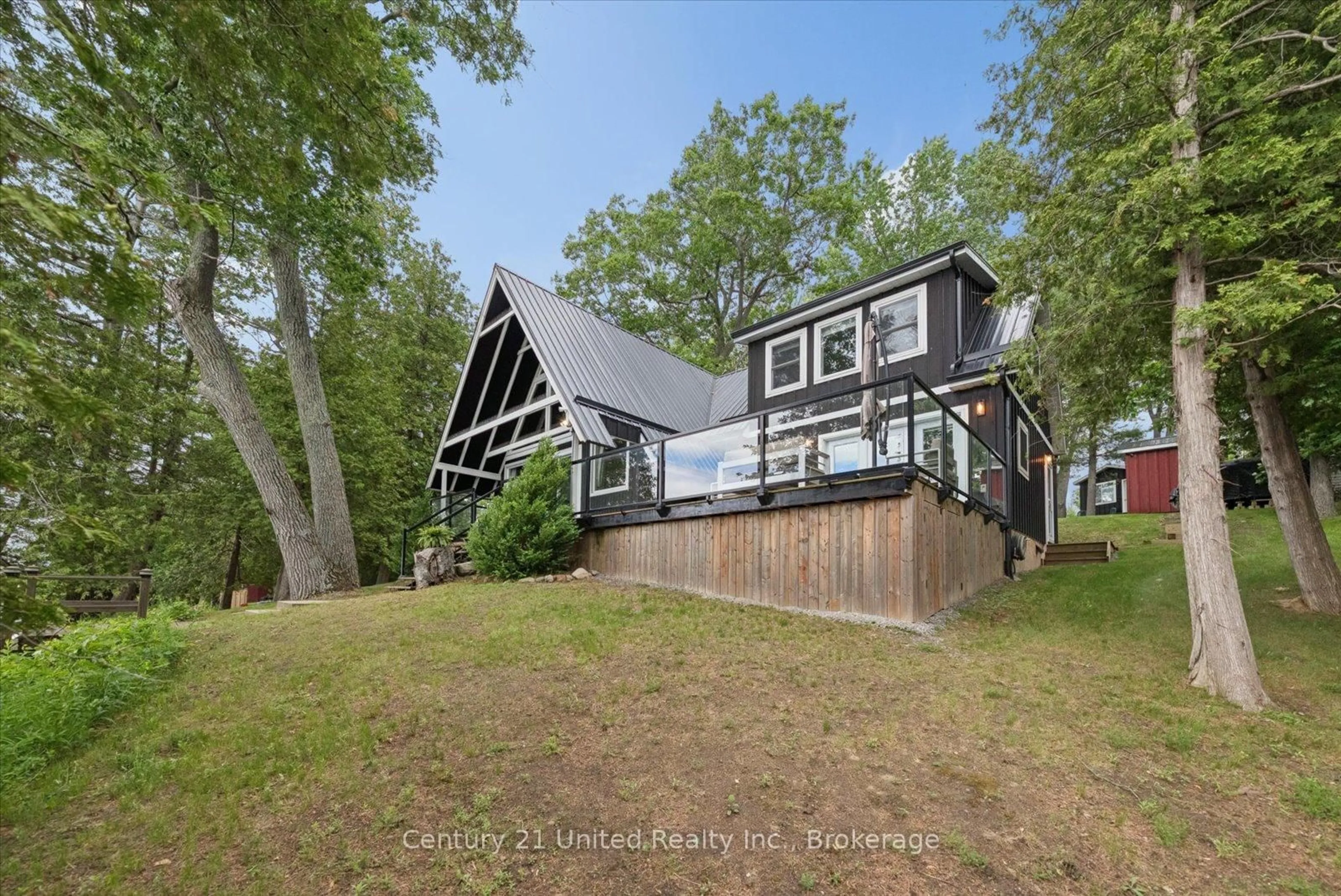 A pic from outside/outdoor area/front of a property/back of a property/a pic from drone, water/lake/river/ocean view for 54 Cow Island, Otonabee-South Monaghan Ontario K0L 1B0