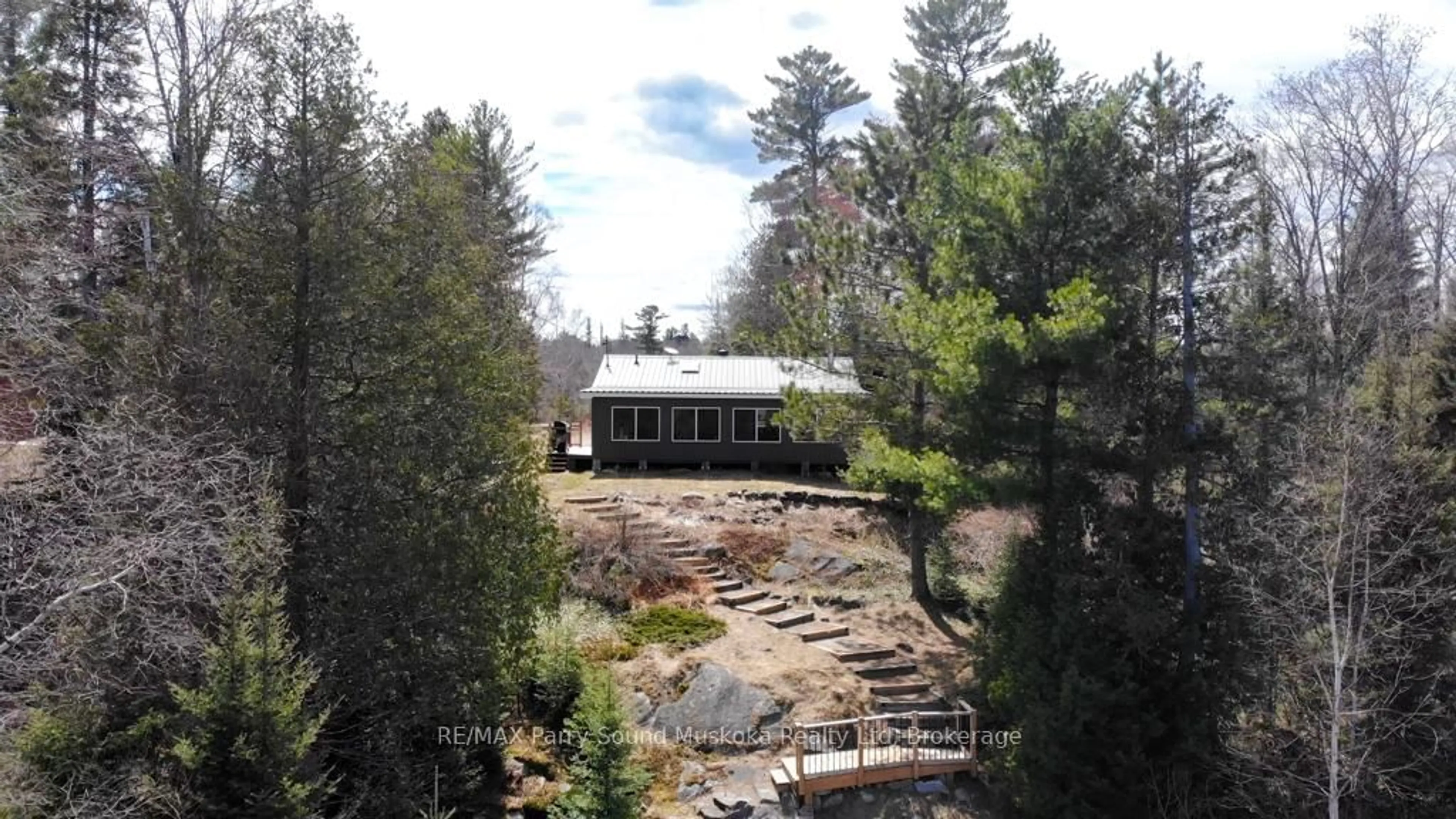 A pic from outside/outdoor area/front of a property/back of a property/a pic from drone, water/lake/river/ocean view for 93 White Pine Rd, Unorganized Townships Ontario P0H 2K0