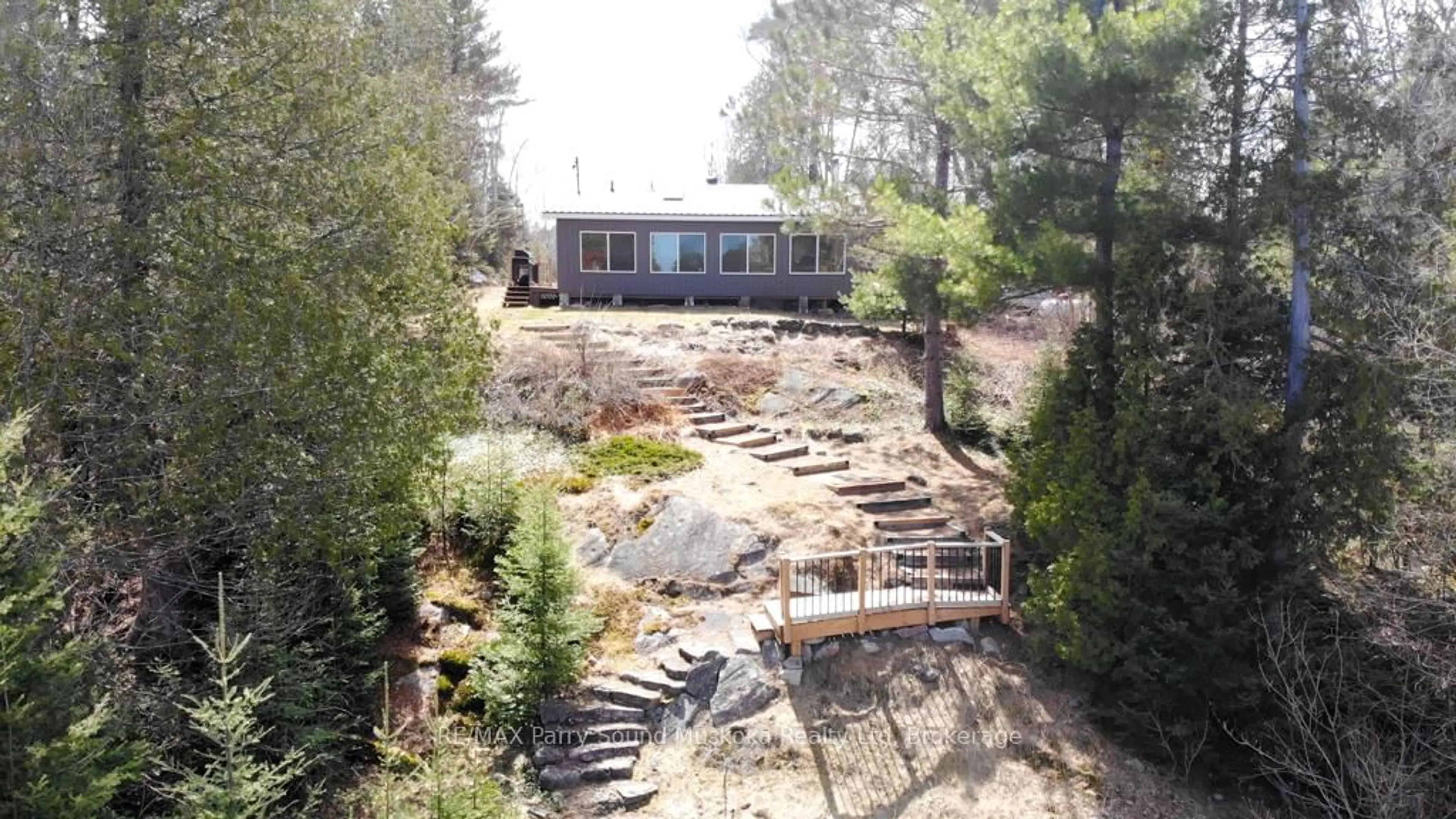 A pic from outside/outdoor area/front of a property/back of a property/a pic from drone, forest/trees view for 93 White Pine Rd, Unorganized Townships Ontario P0H 2K0