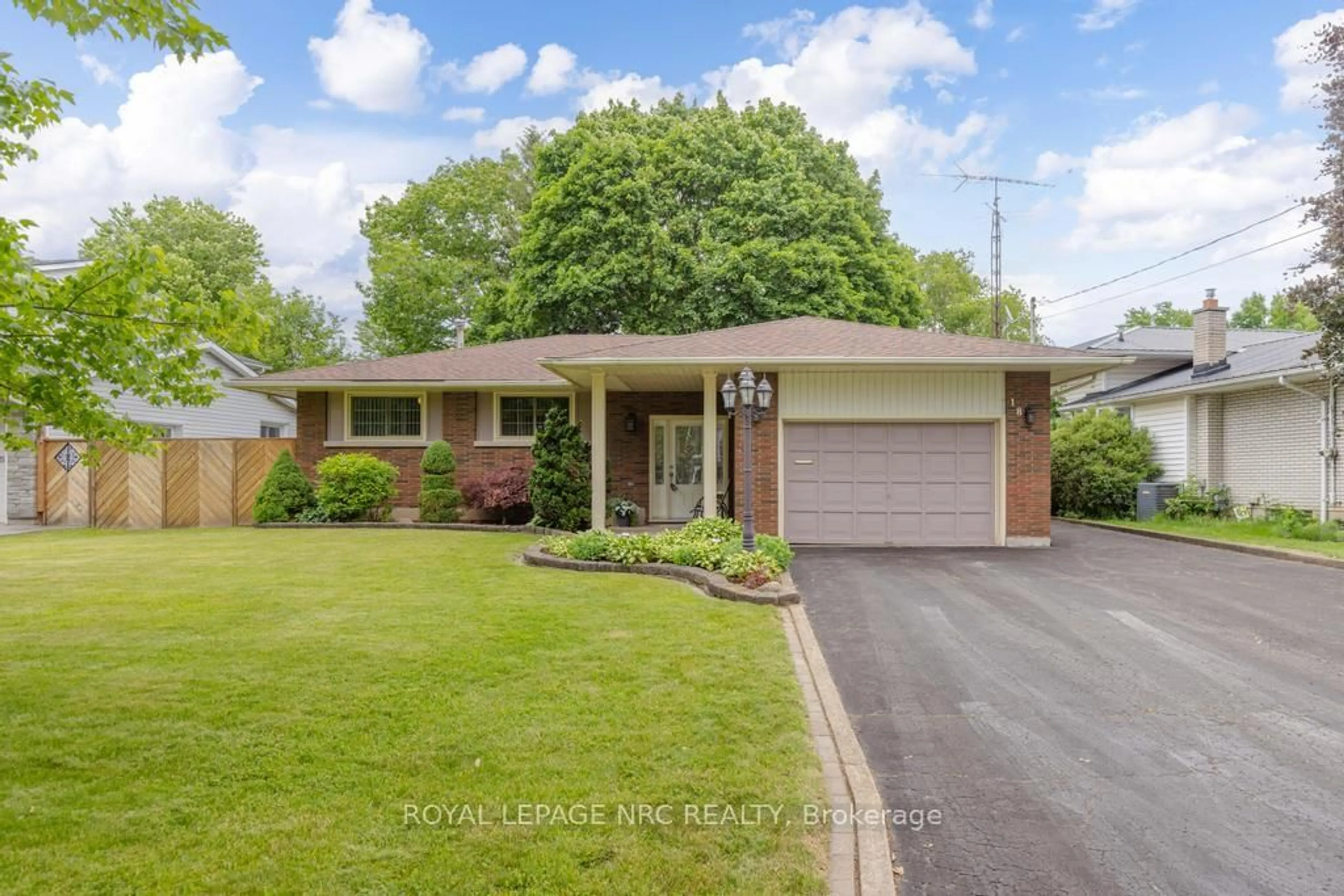 Home with brick exterior material, street for 18 Cartier Dr, St. Catharines Ontario L2M 2E6