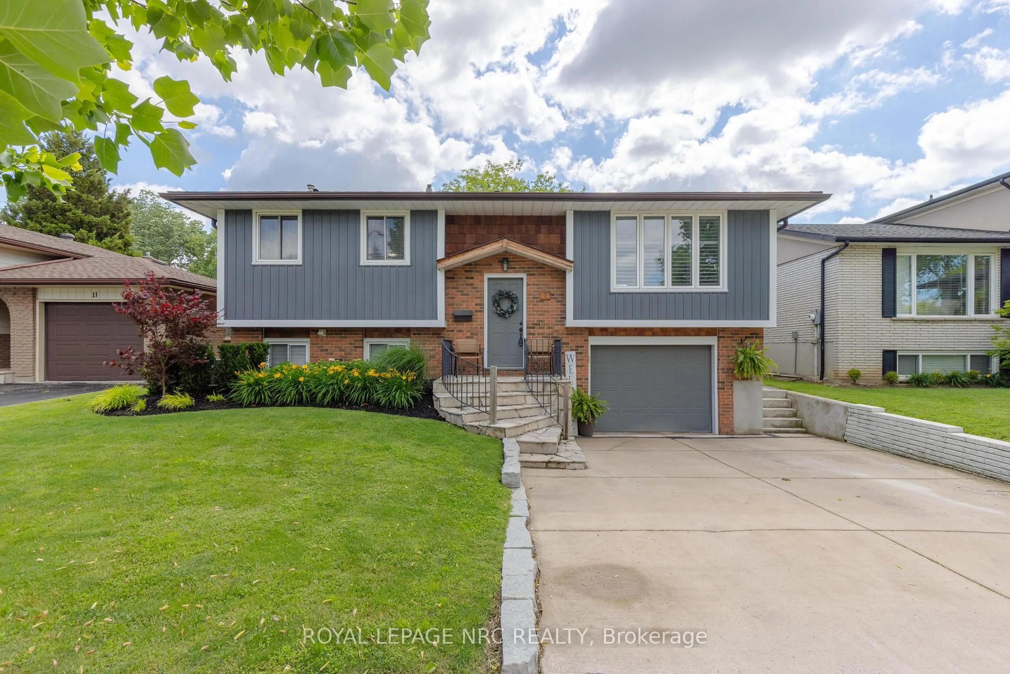 Home with vinyl exterior material, street for 13 Orlando Dr, St. Catharines Ontario L2N 6V5