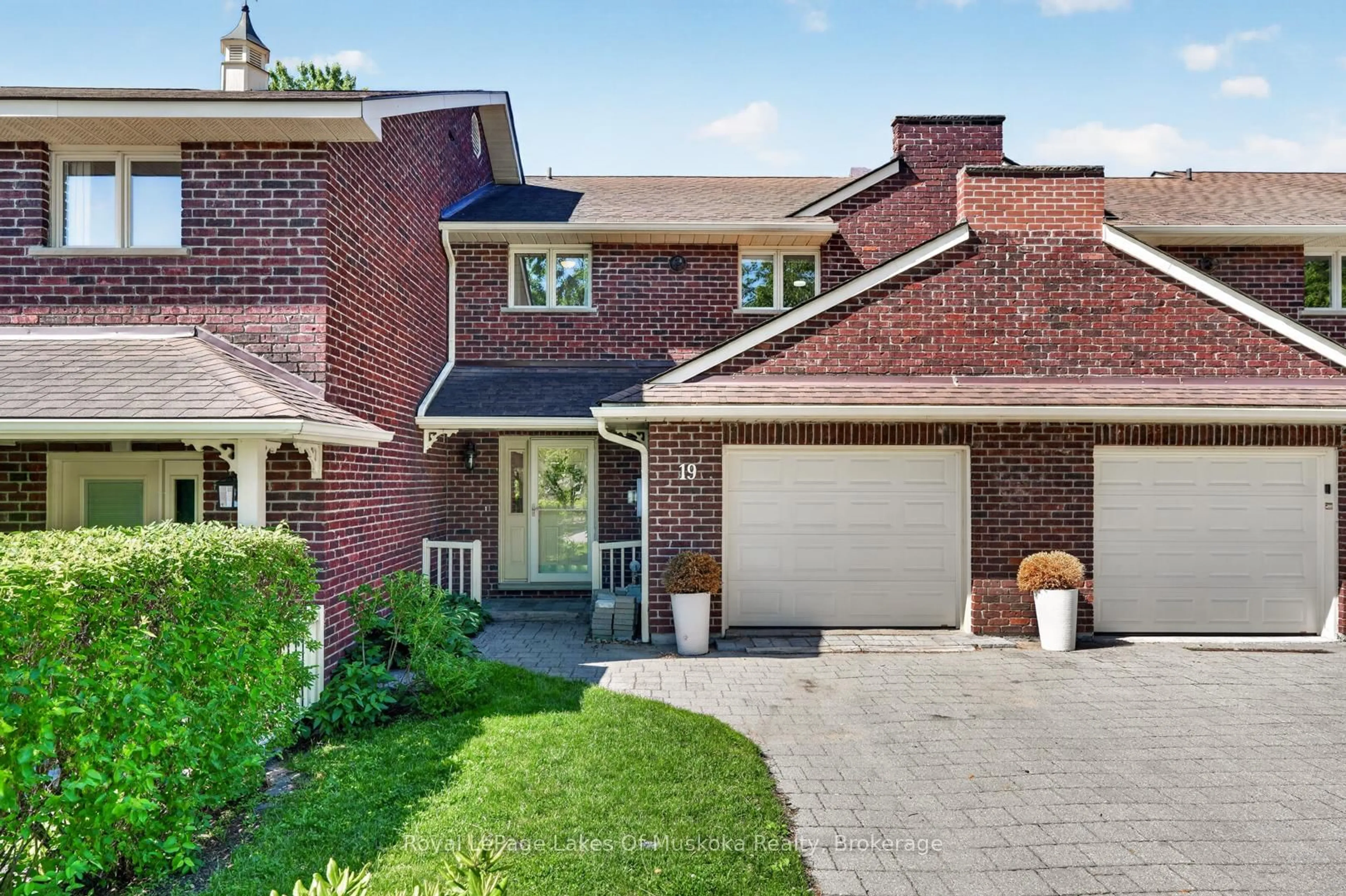 Home with brick exterior material, street for 19 John St, Huntsville Ontario P1H 1H2