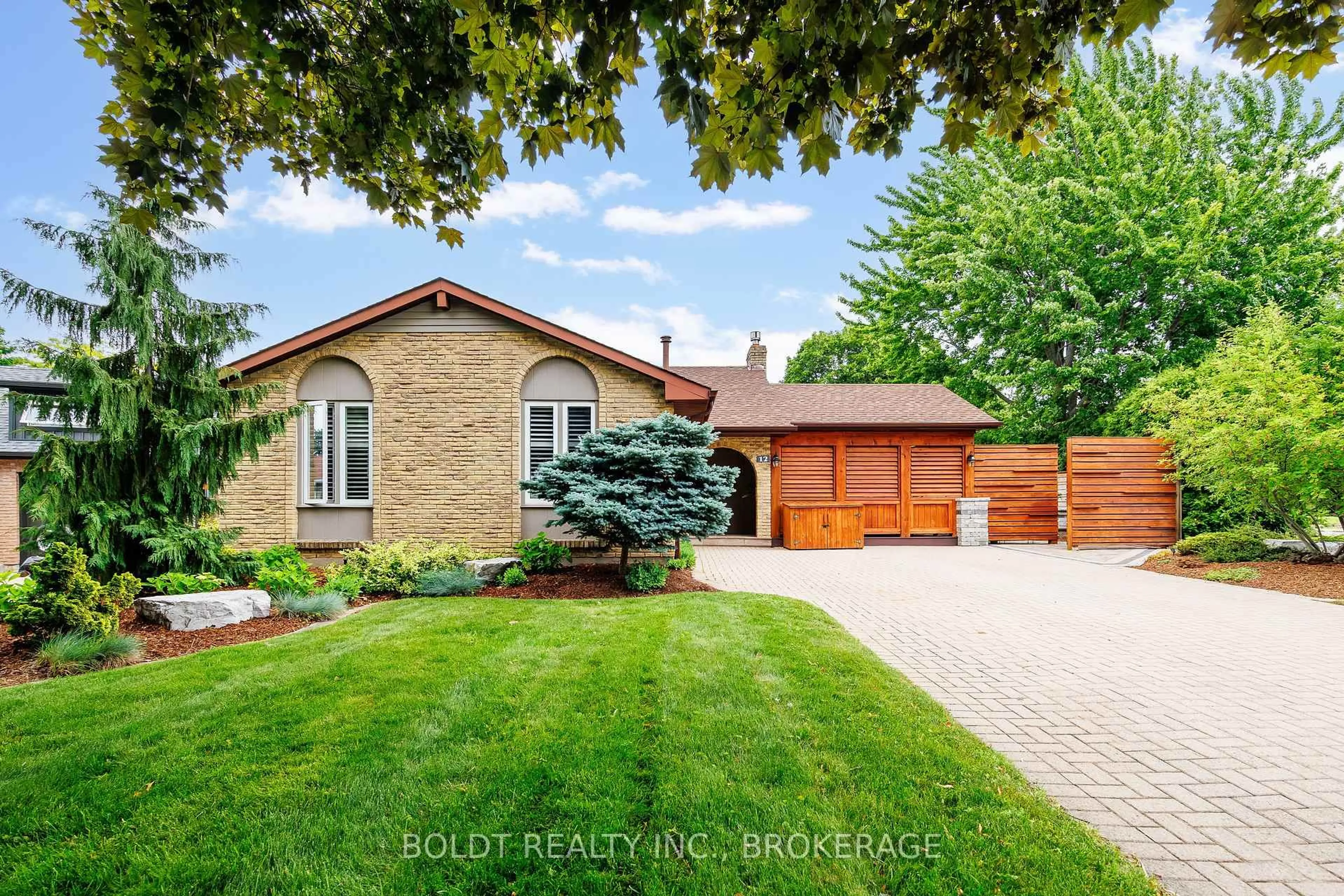 Home with brick exterior material, street for 12 Cole Farm Blvd, St. Catharines Ontario L2N 6W1