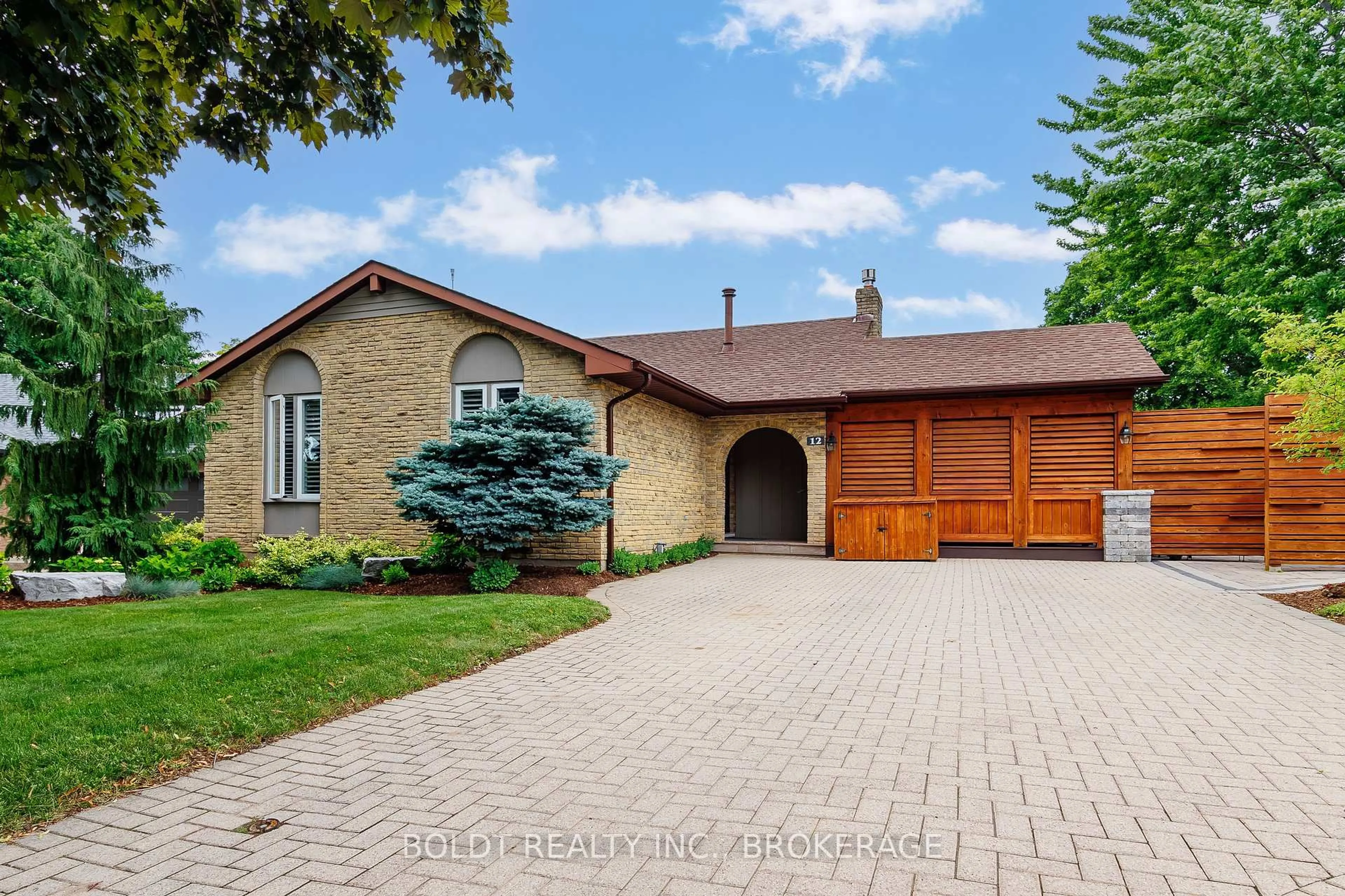 Home with brick exterior material, street for 12 Cole Farm Blvd, St. Catharines Ontario L2N 6W1