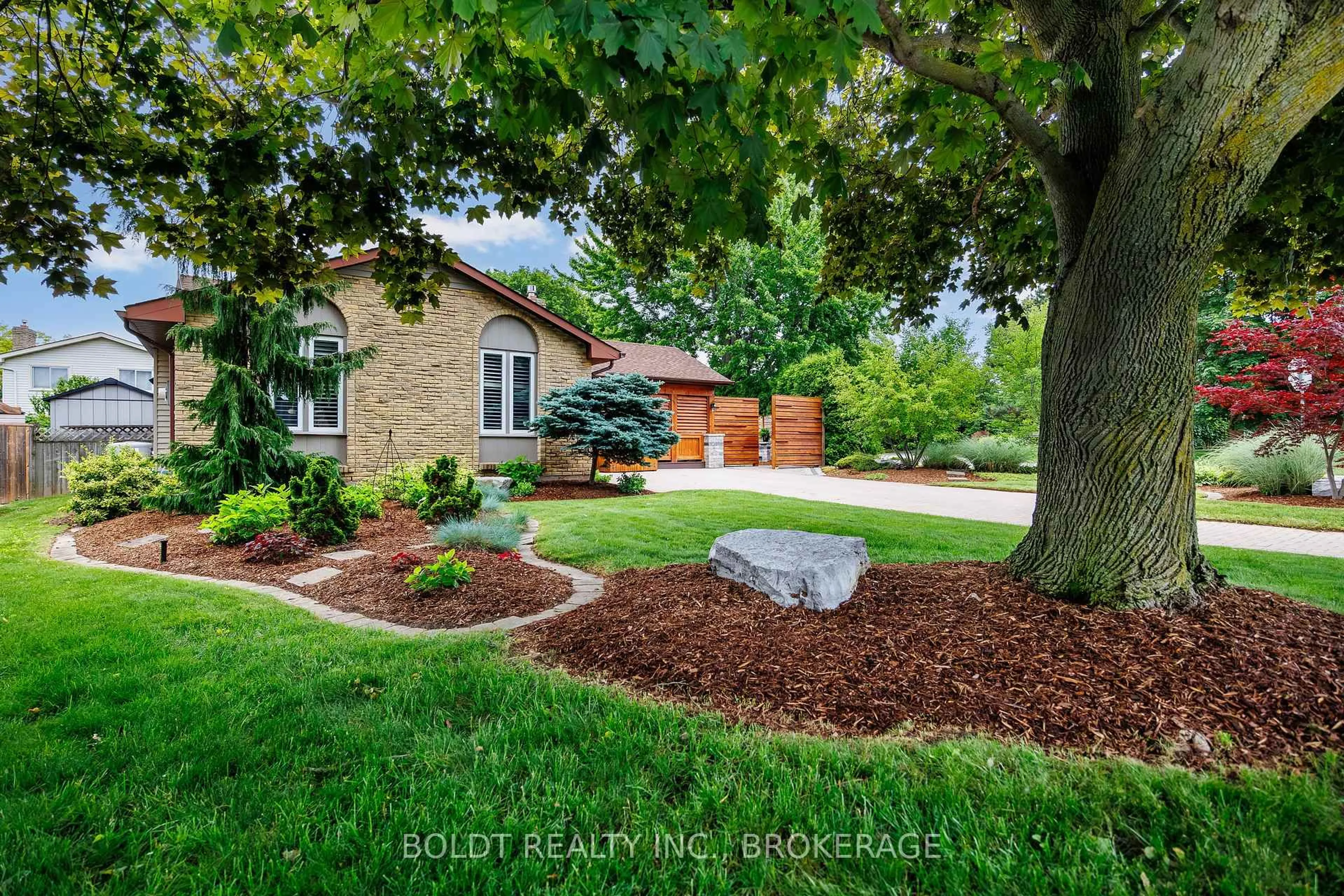 Home with brick exterior material, street for 12 Cole Farm Blvd, St. Catharines Ontario L2N 6W1