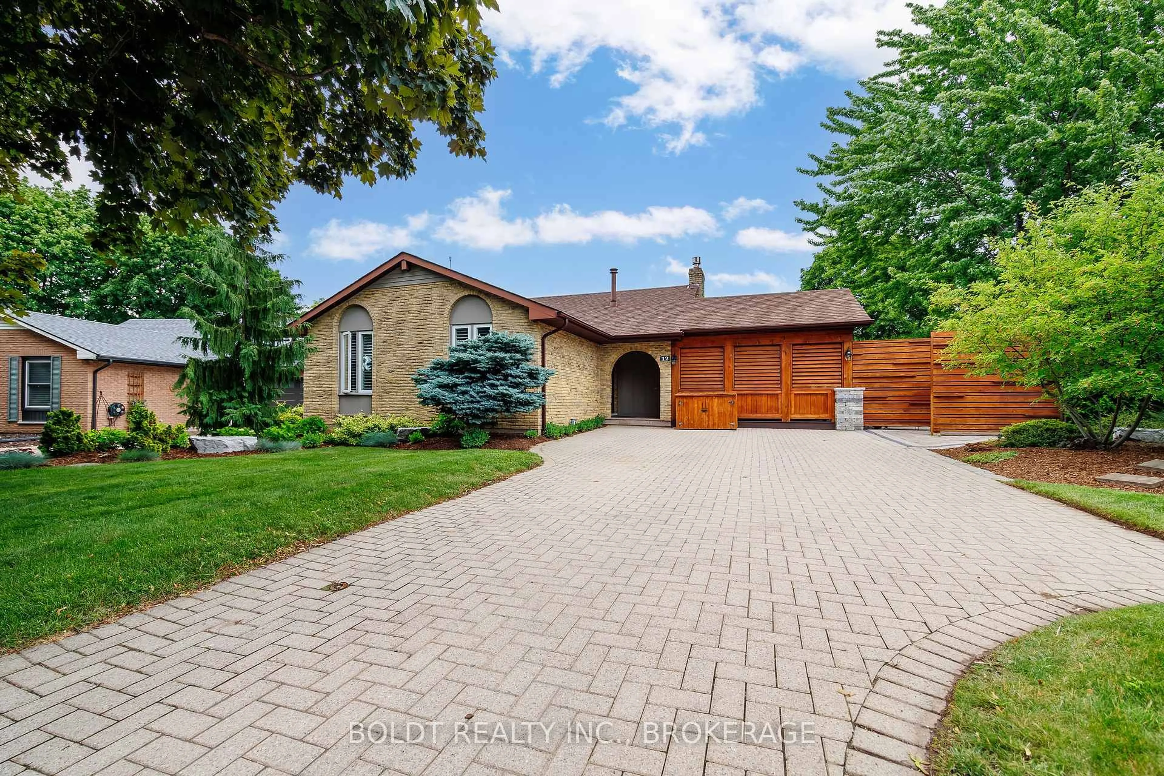 Home with brick exterior material, street for 12 Cole Farm Blvd, St. Catharines Ontario L2N 6W1