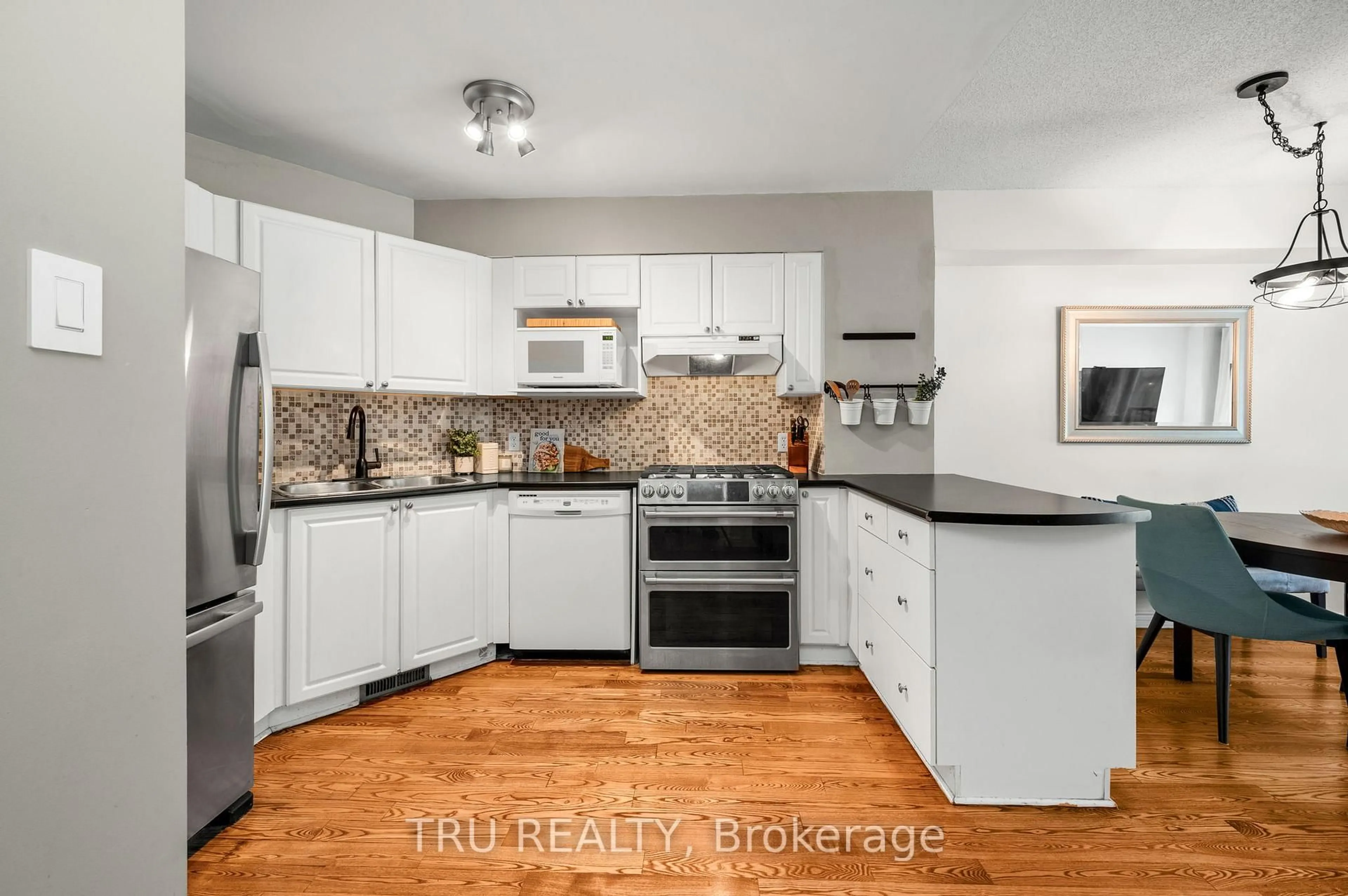 Open concept kitchen, unknown for 27 Celebration St, Ottawa Ontario K2C 4A6