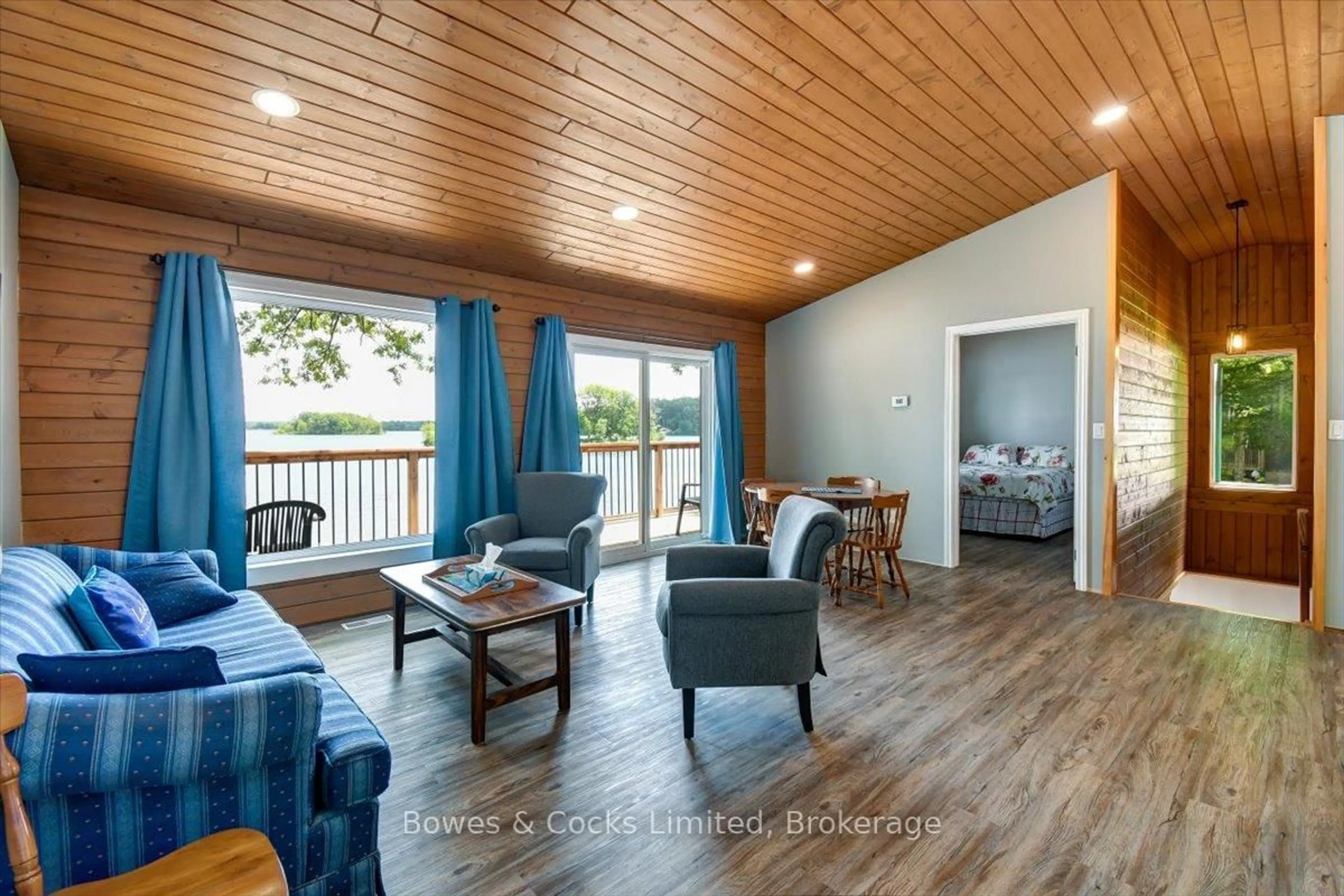 Living room with furniture, wood/laminate floor for 399 Blairton Rd, Havelock-Belmont-Methuen Ontario K0L 1Z0