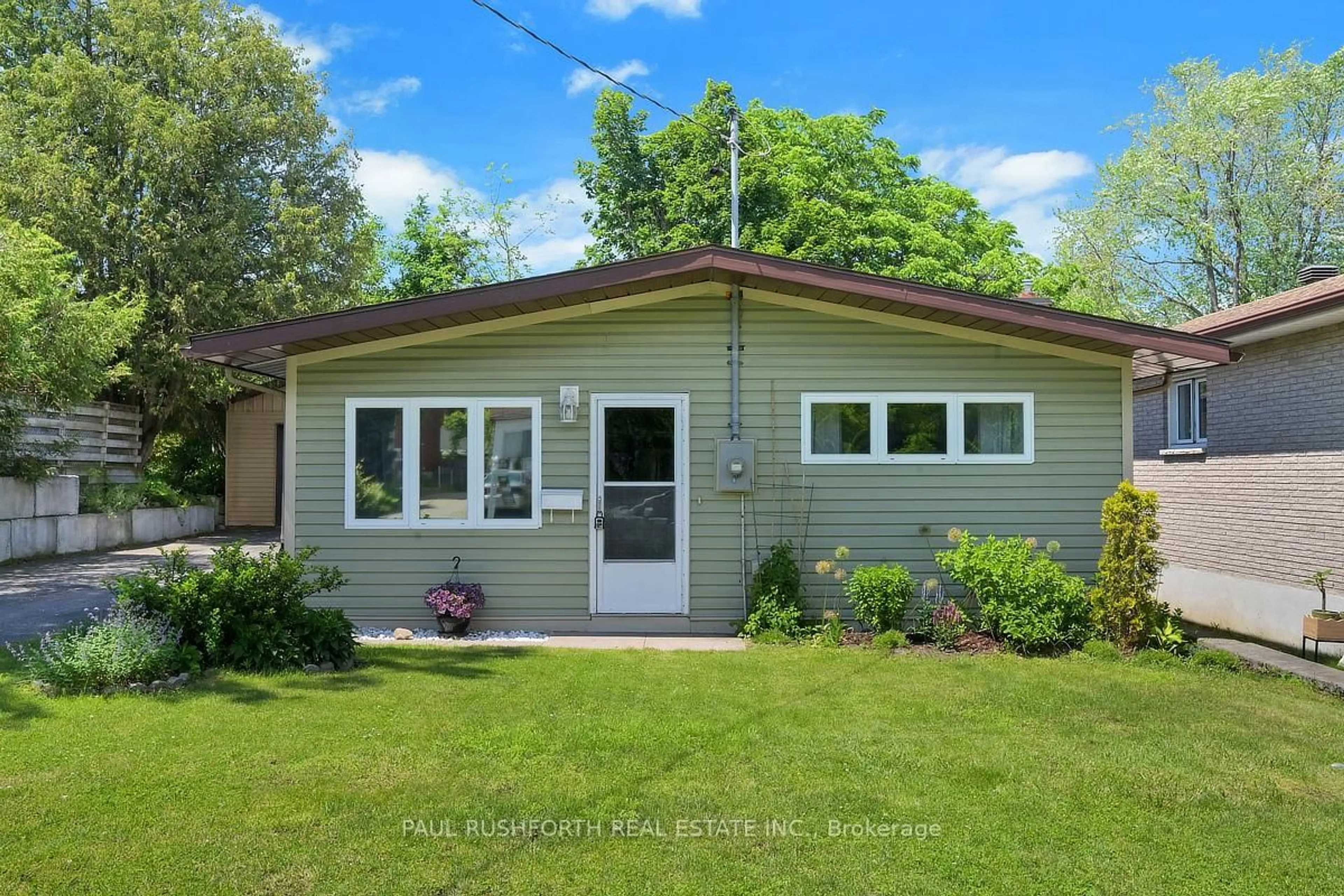 Home with vinyl exterior material, street for 74 Burland St, Ottawa Ontario K2B 6K1