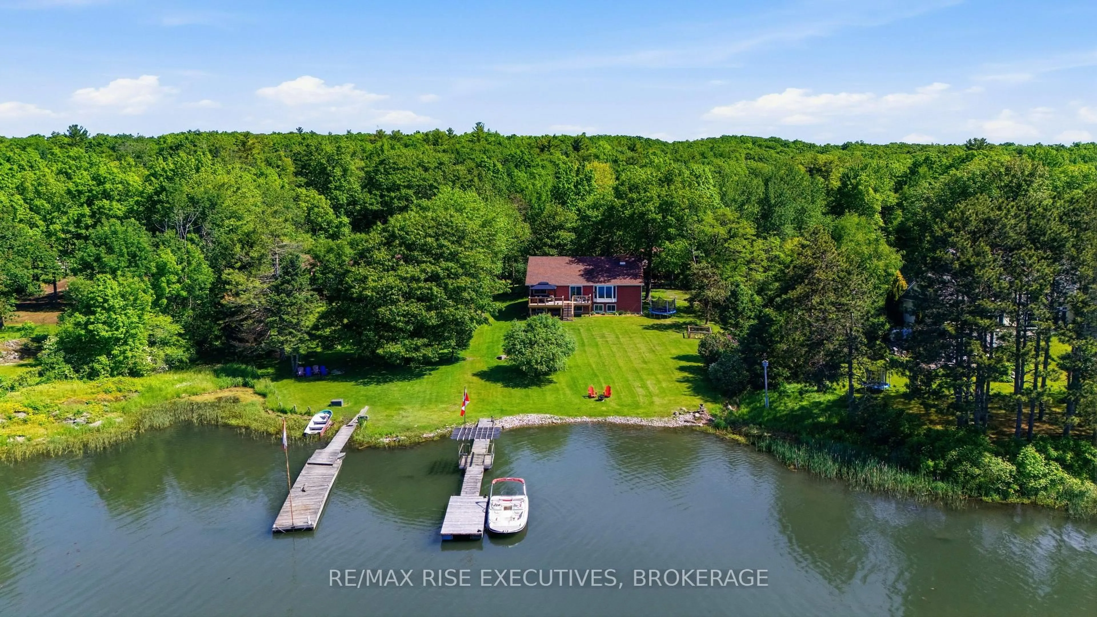 A pic from outside/outdoor area/front of a property/back of a property/a pic from drone, water/lake/river/ocean view for 1520 Shore Rd, Kingston Ontario K7L 0C1