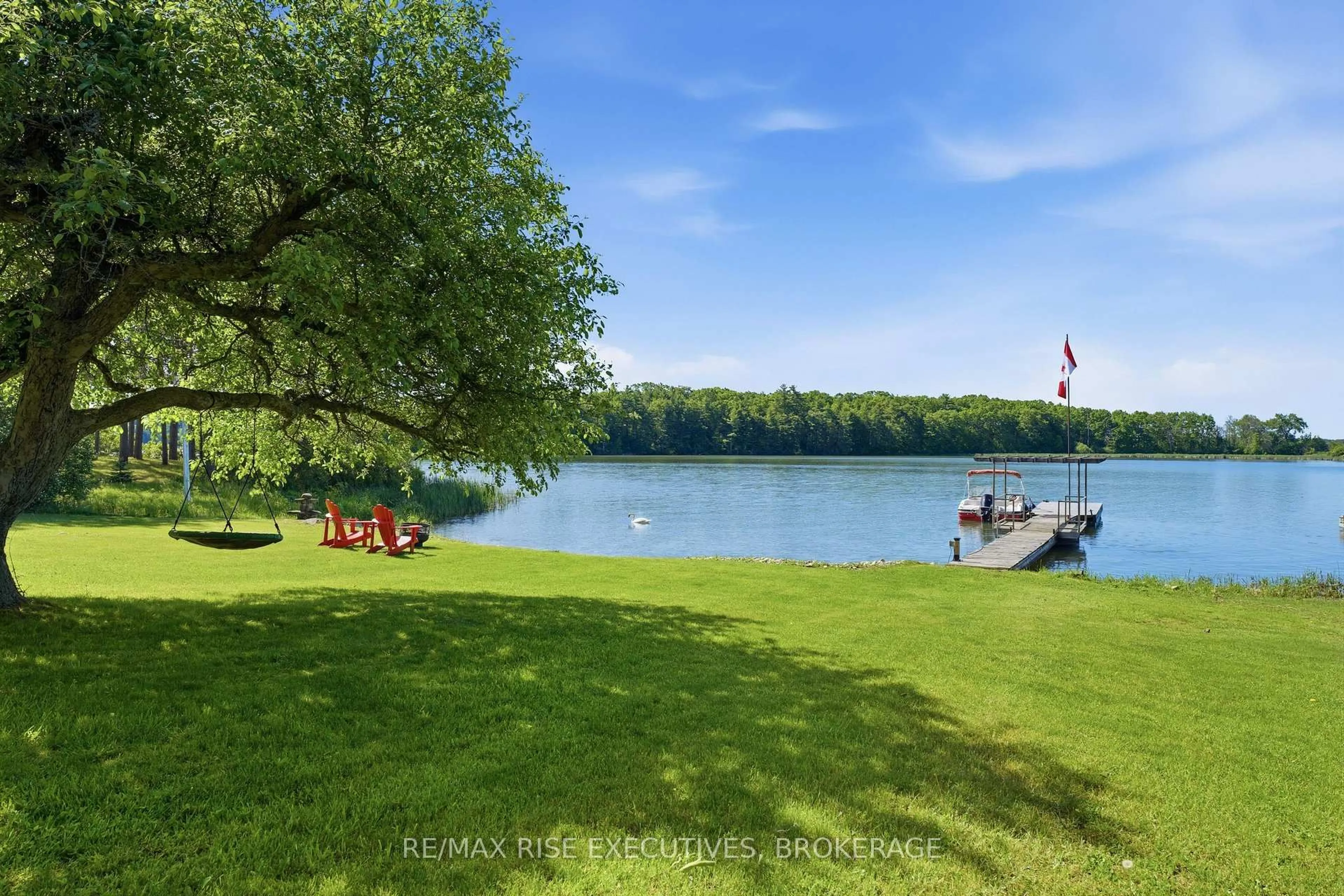 A pic from outside/outdoor area/front of a property/back of a property/a pic from drone, water/lake/river/ocean view for 1520 Shore Rd, Kingston Ontario K7L 0C1