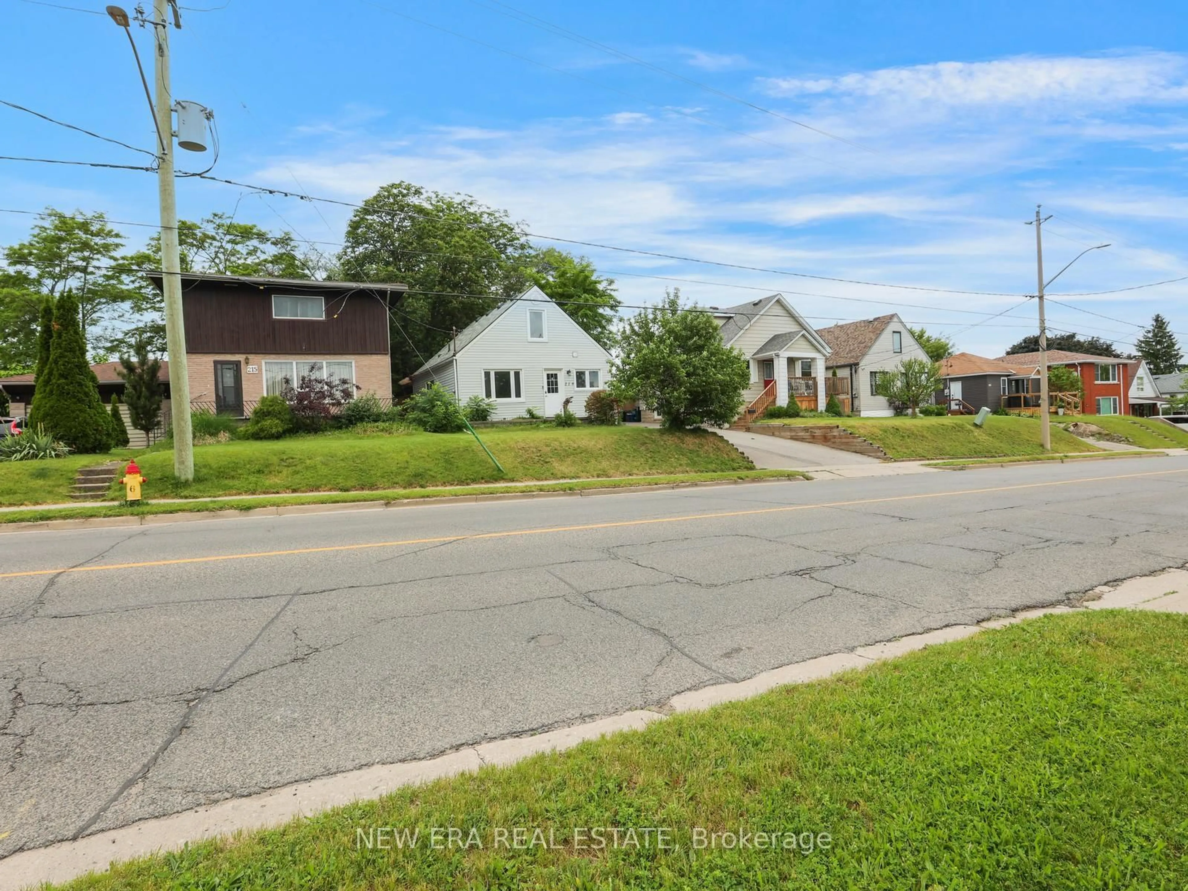 A pic from outside/outdoor area/front of a property/back of a property/a pic from drone, street for 219 Lancaster St, Kitchener Ontario N2H 4T9
