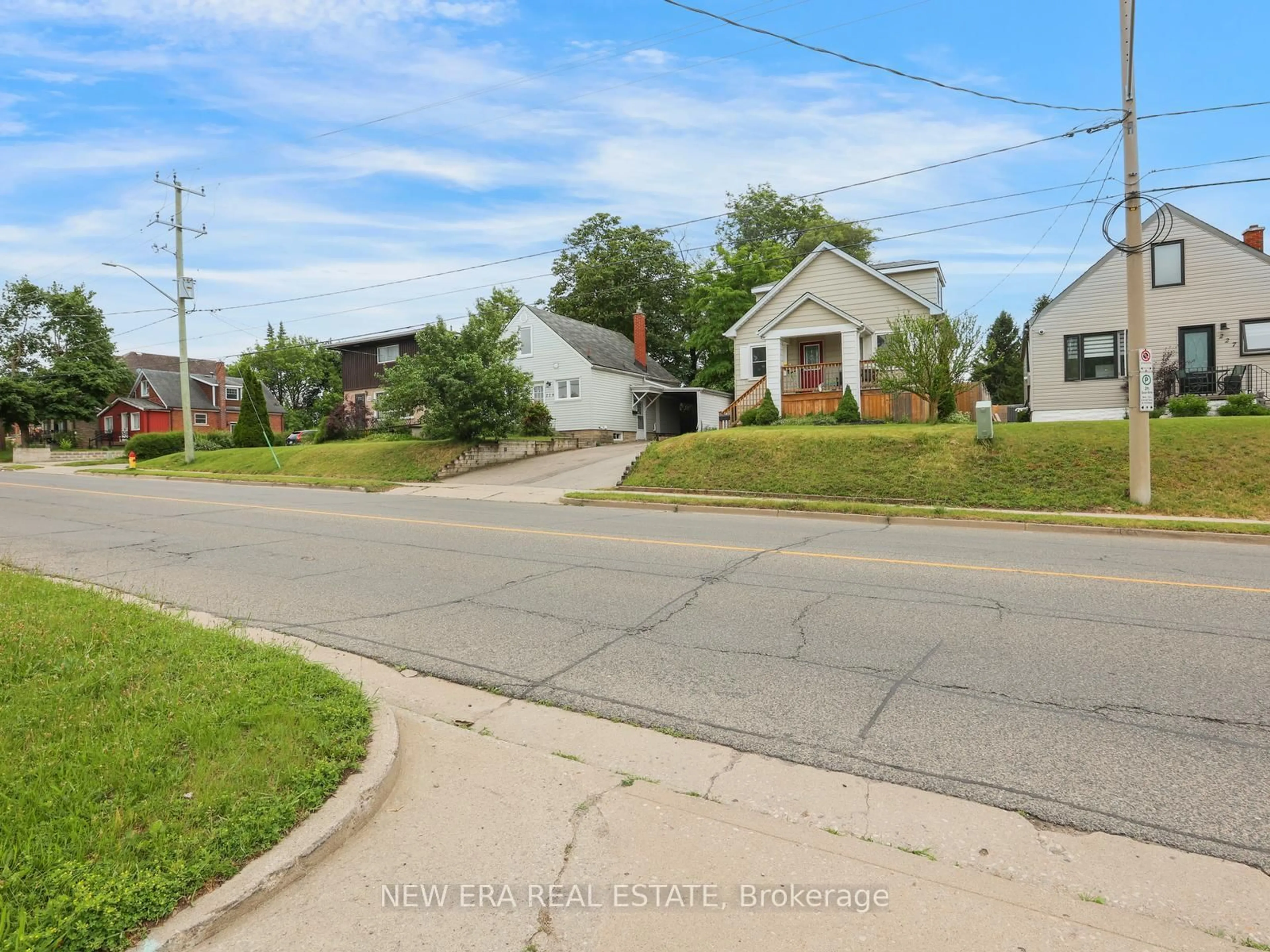 A pic from outside/outdoor area/front of a property/back of a property/a pic from drone, street for 219 Lancaster St, Kitchener Ontario N2H 4T9