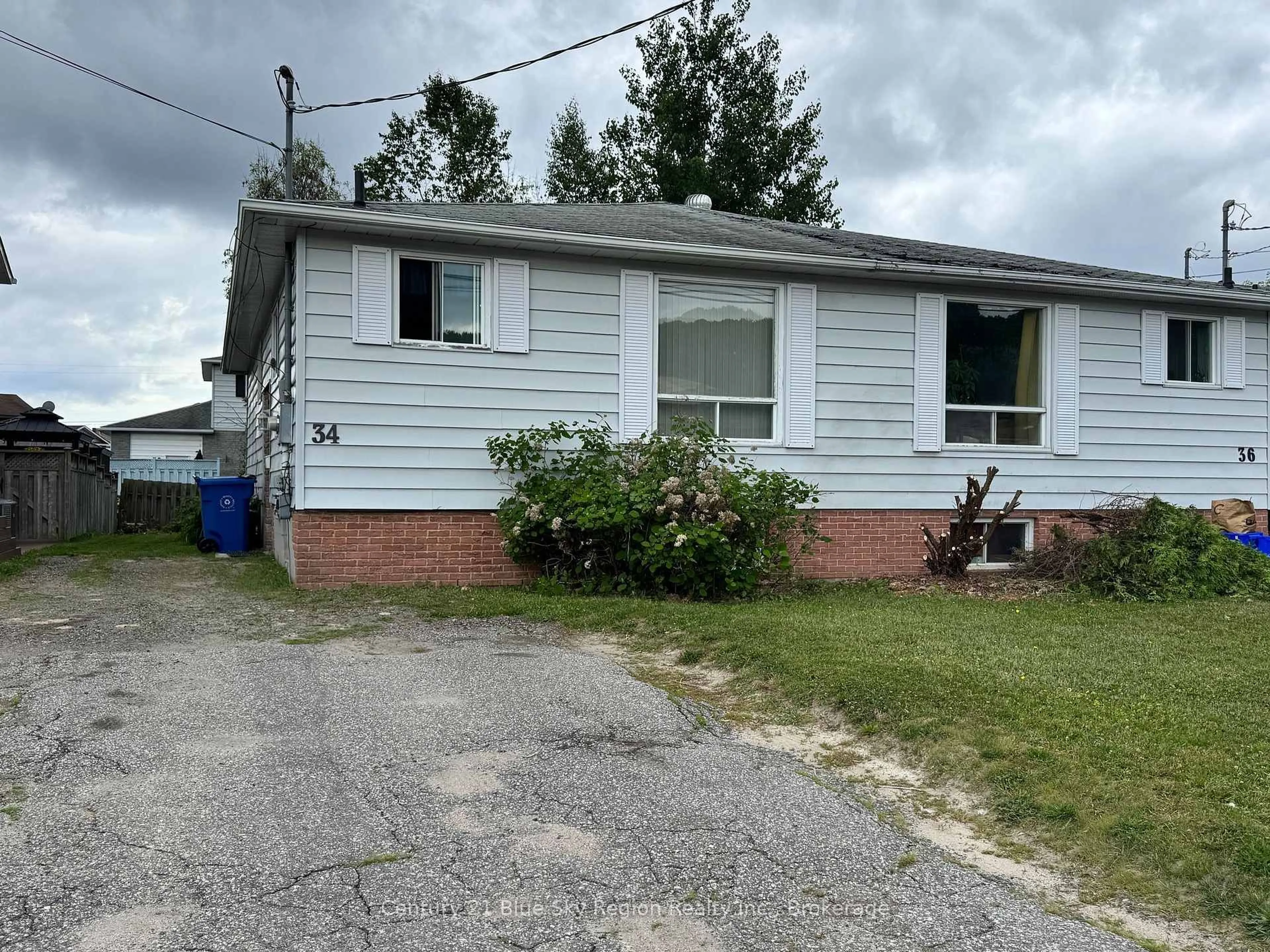 Home with vinyl exterior material, street for 34 McGibbon St, North Bay Ontario P1B 8R6