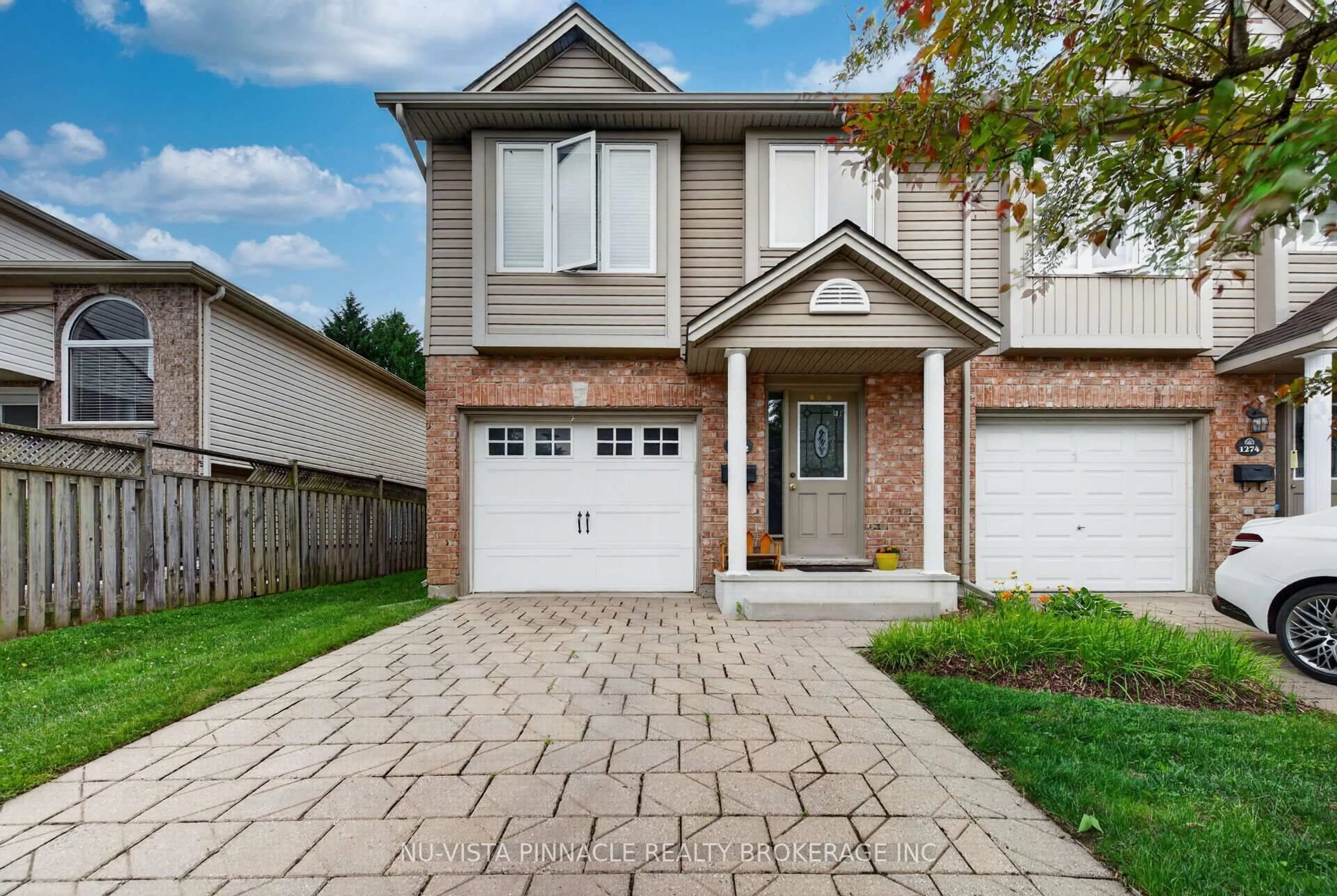 Home with brick exterior material, street for 1272 Savannah Dr, London North Ontario N5X 0B7