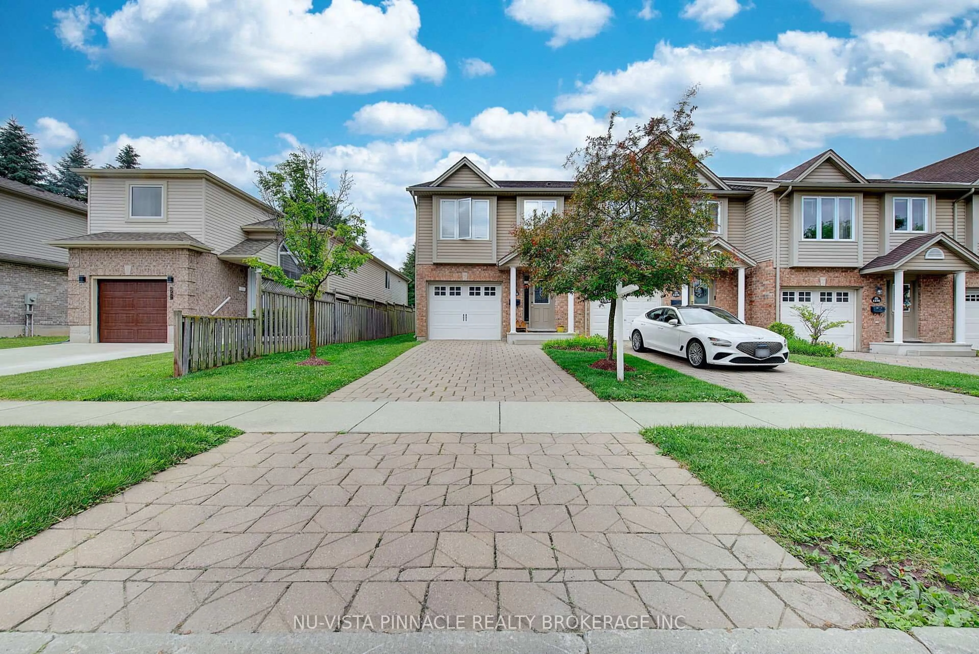A pic from outside/outdoor area/front of a property/back of a property/a pic from drone, street for 1272 Savannah Dr, London North Ontario N5X 0B7