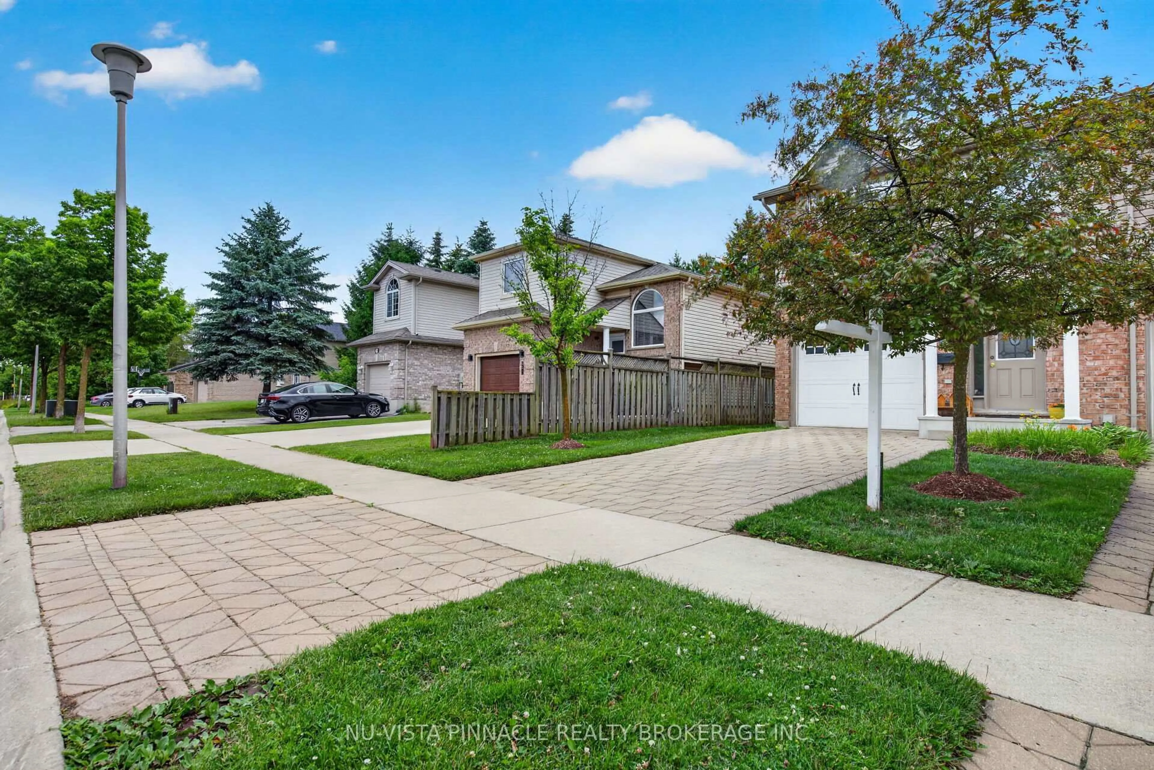 A pic from outside/outdoor area/front of a property/back of a property/a pic from drone, street for 1272 Savannah Dr, London North Ontario N5X 0B7