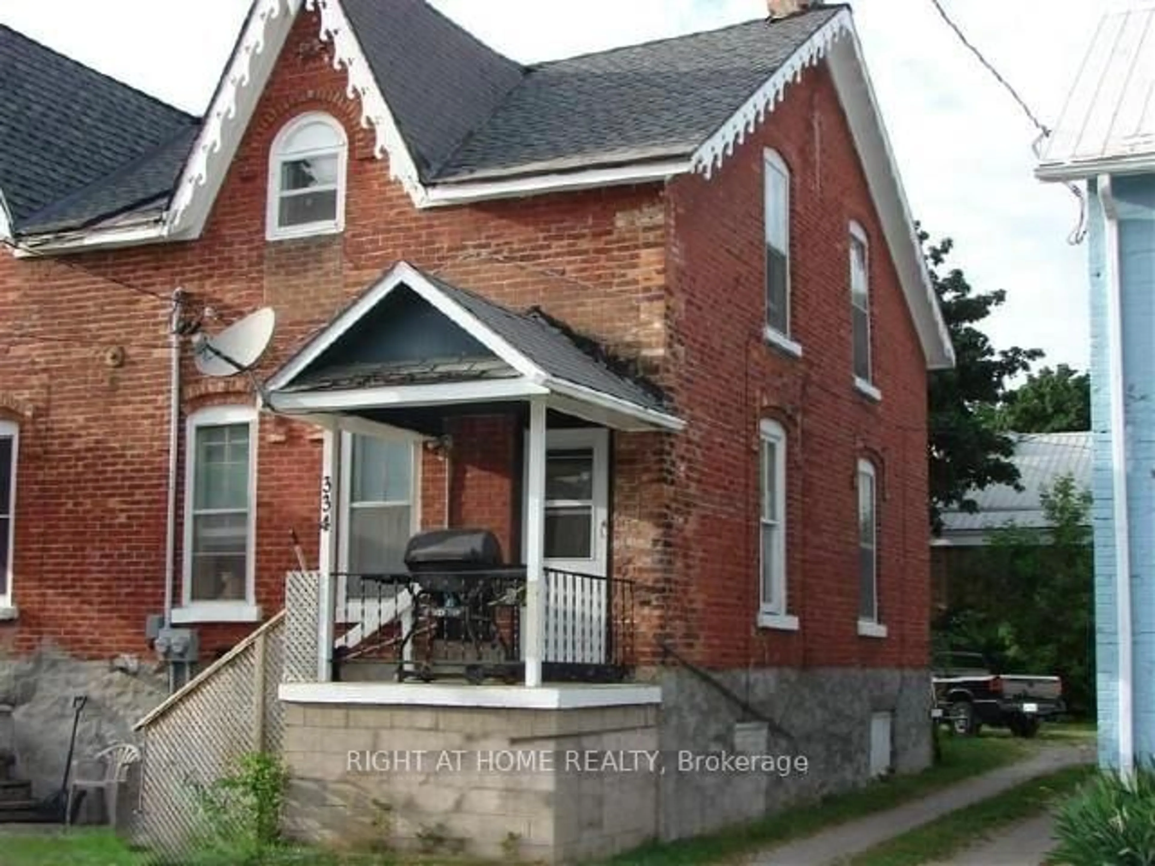 Home with brick exterior material, street for 326 & 334 11th St, Owen Sound Ontario N4K 1V2