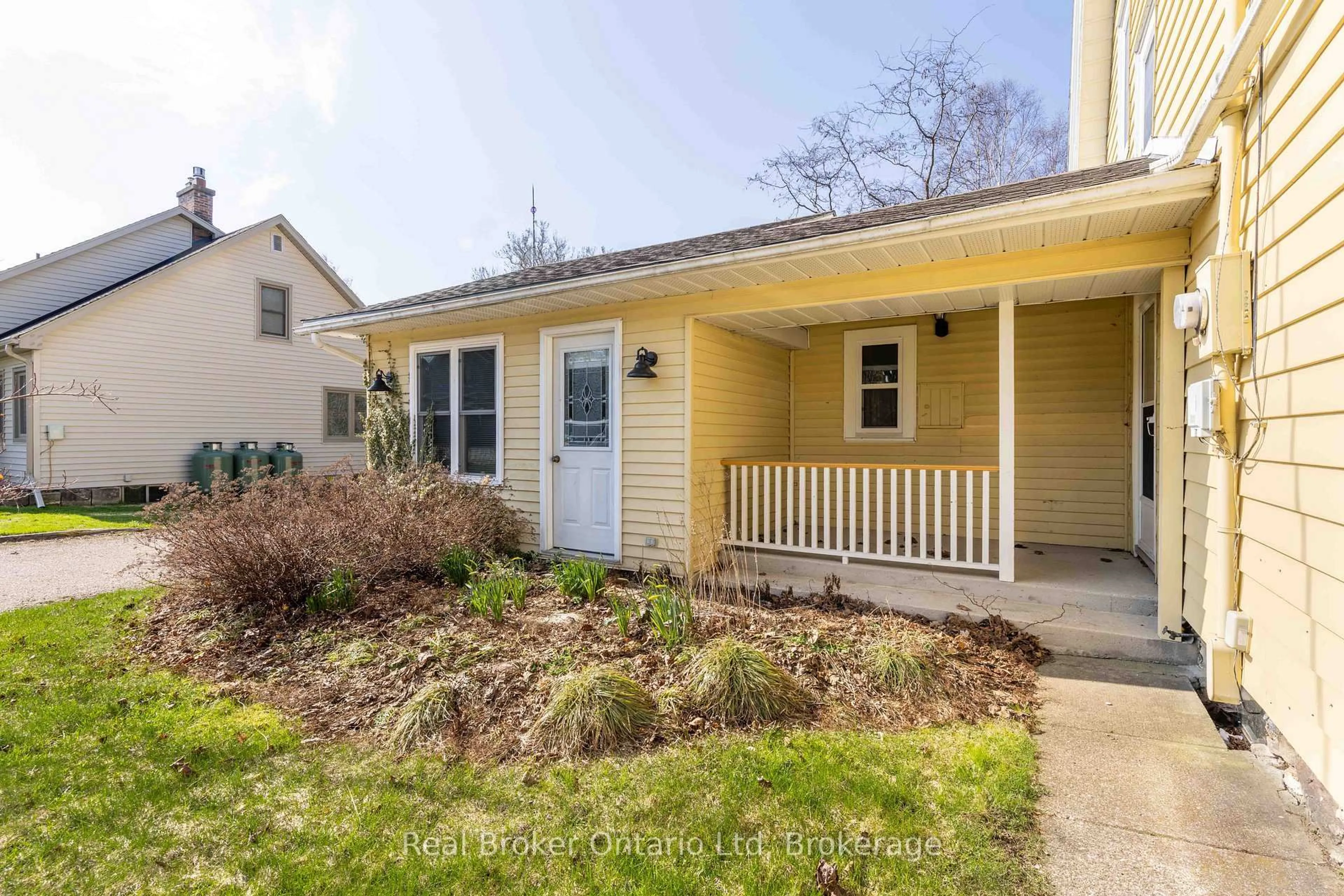 Home with vinyl exterior material, street for 303022 Grey 15 Rd, Meaford Ontario N0H 1B0