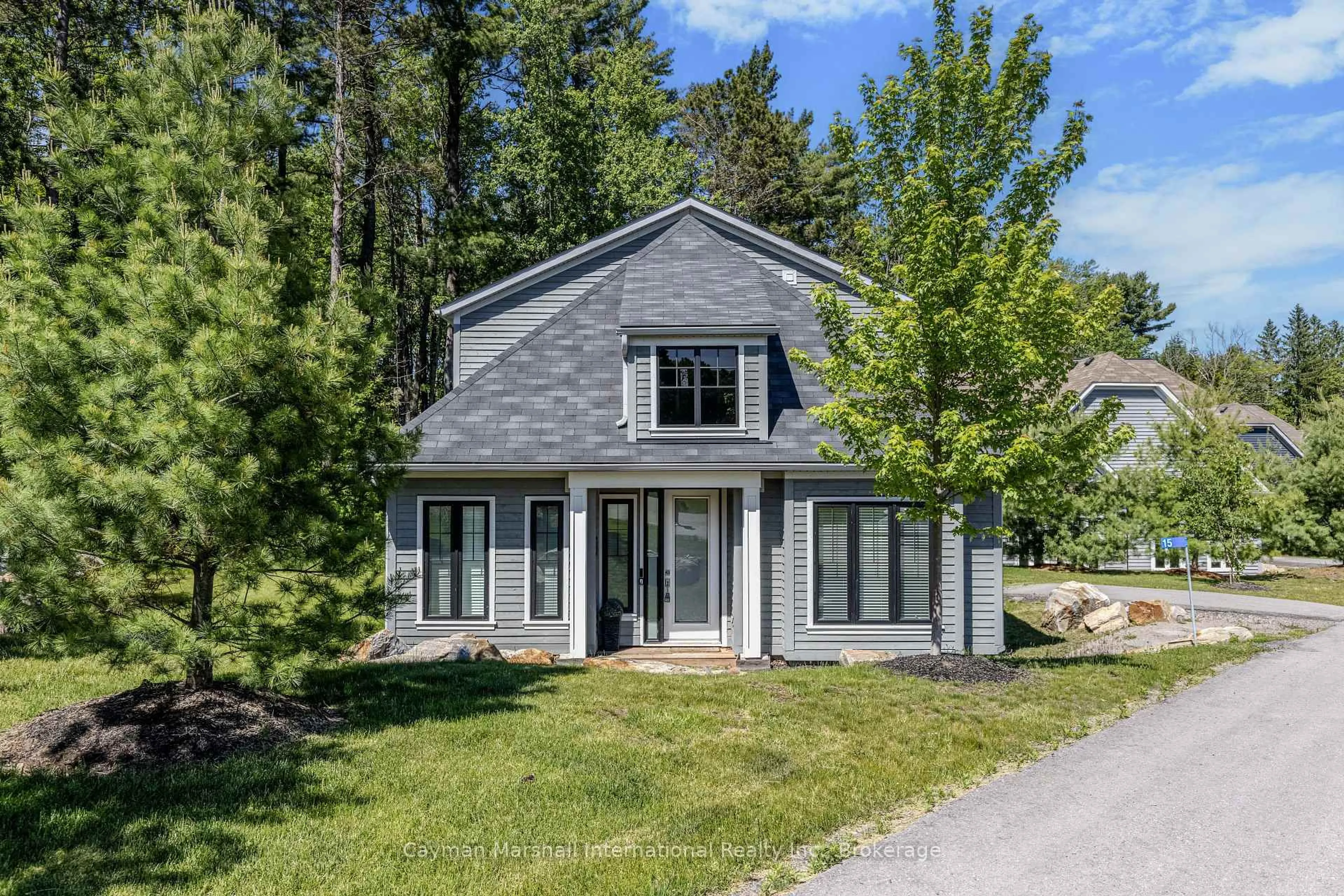 Home with vinyl exterior material, street for 2054 Peninsula Rd #15, Muskoka Lakes Ontario P0B 1G0