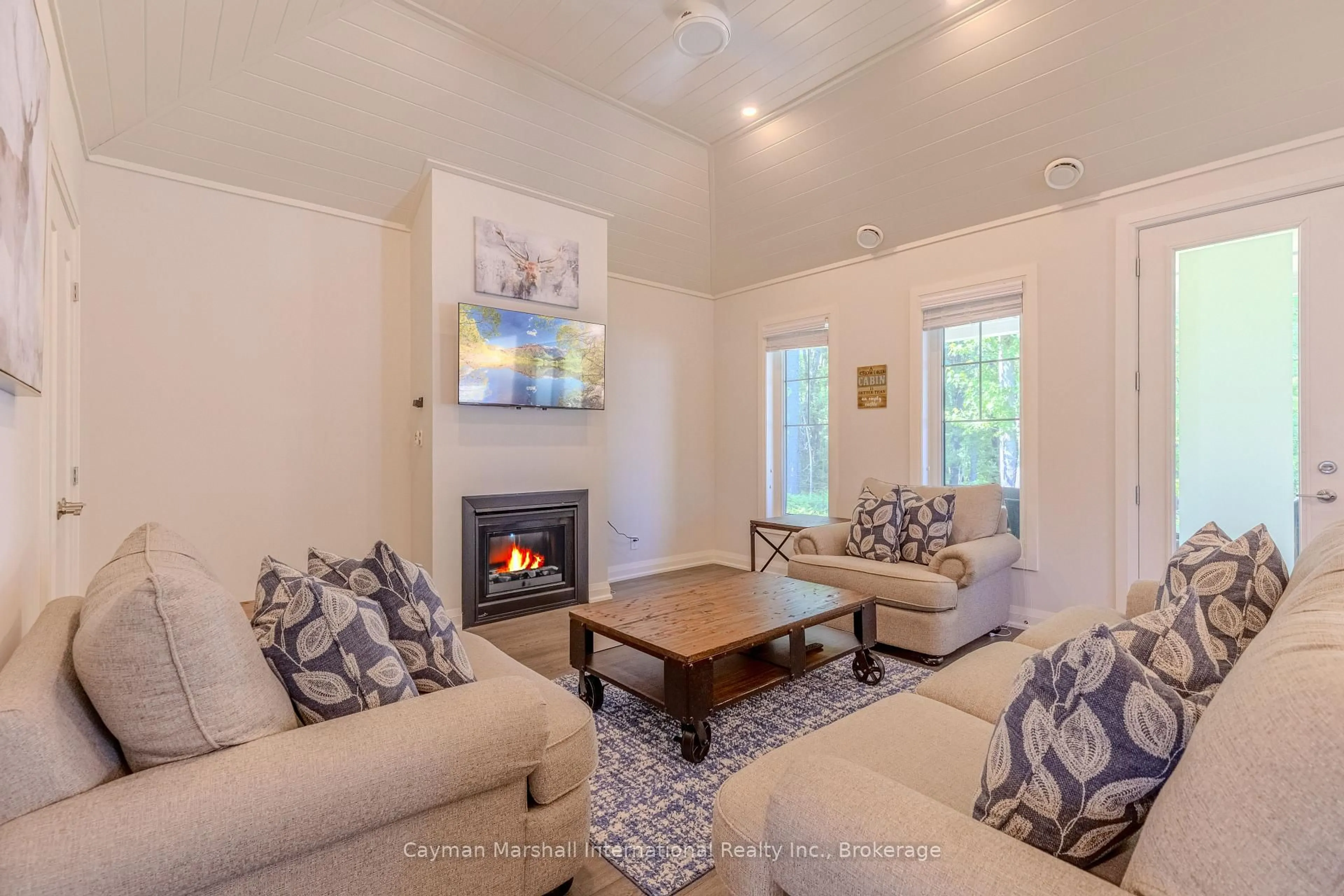 Living room with furniture, unknown for 2054 Peninsula Rd #15, Muskoka Lakes Ontario P0B 1G0