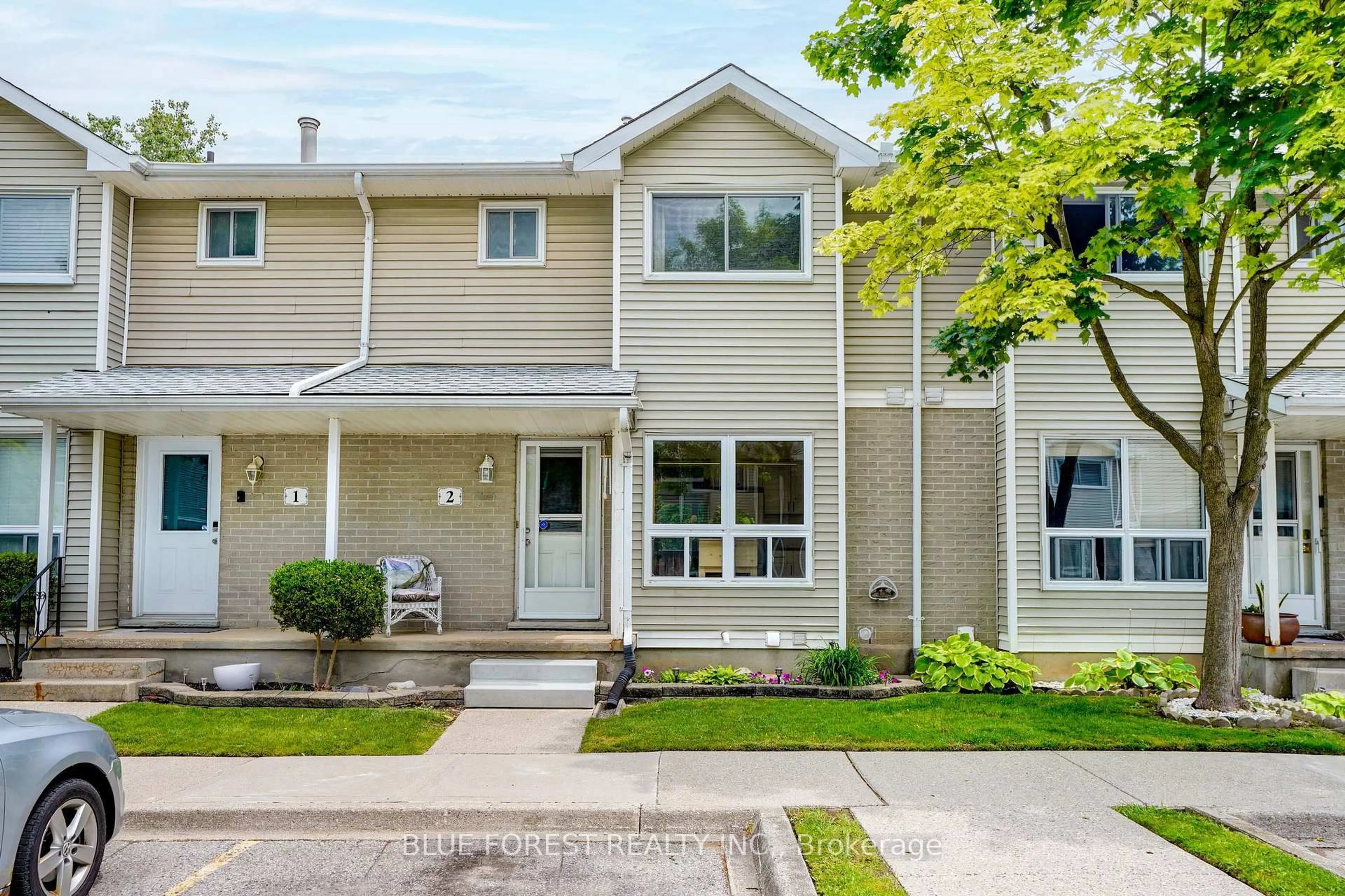 Home with vinyl exterior material, street for 409 Thompson Rd #2, London South Ontario N5Z 4Z1