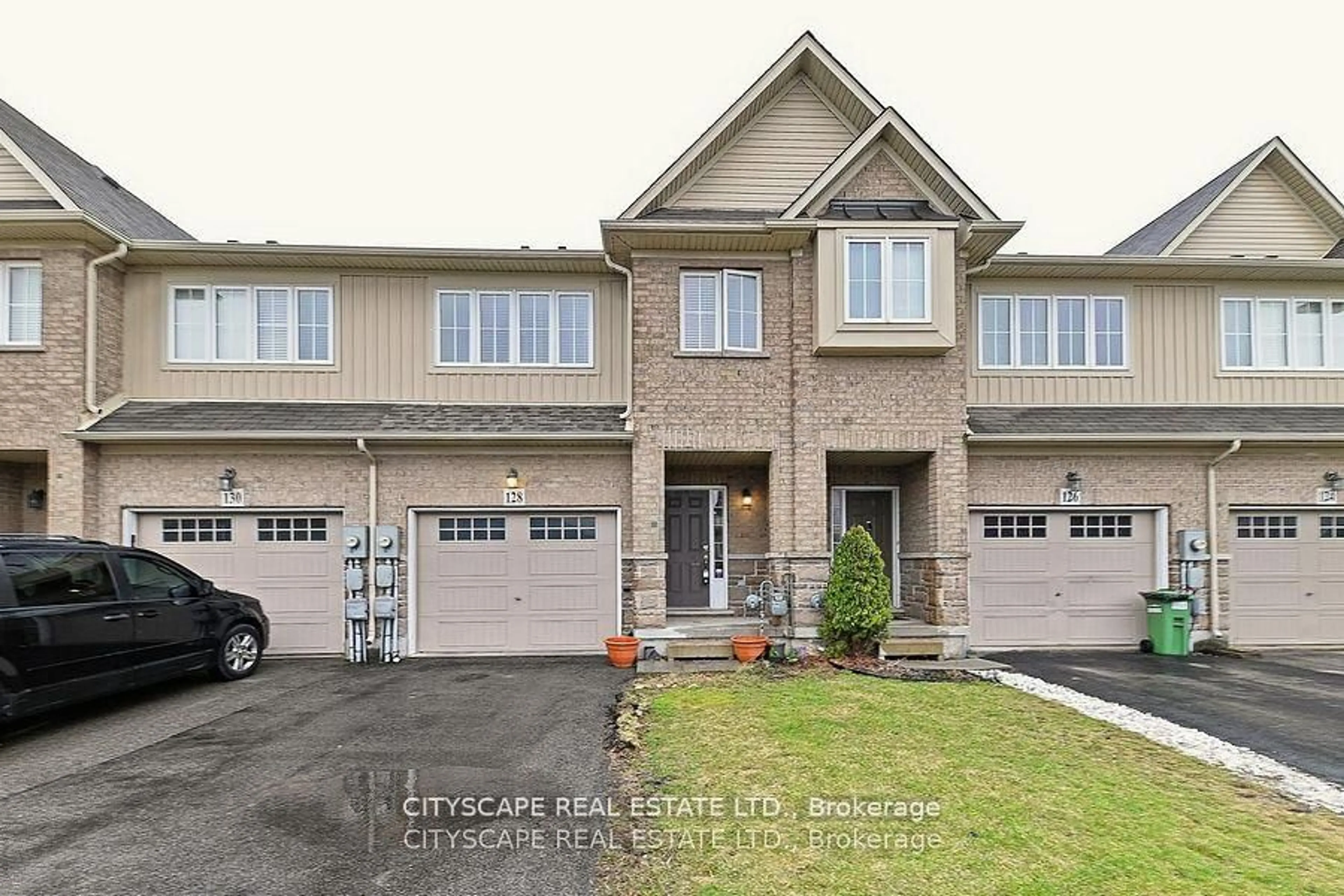 Home with brick exterior material, street for 128 Palacebeach Tr, Hamilton Ontario L8E 0C3