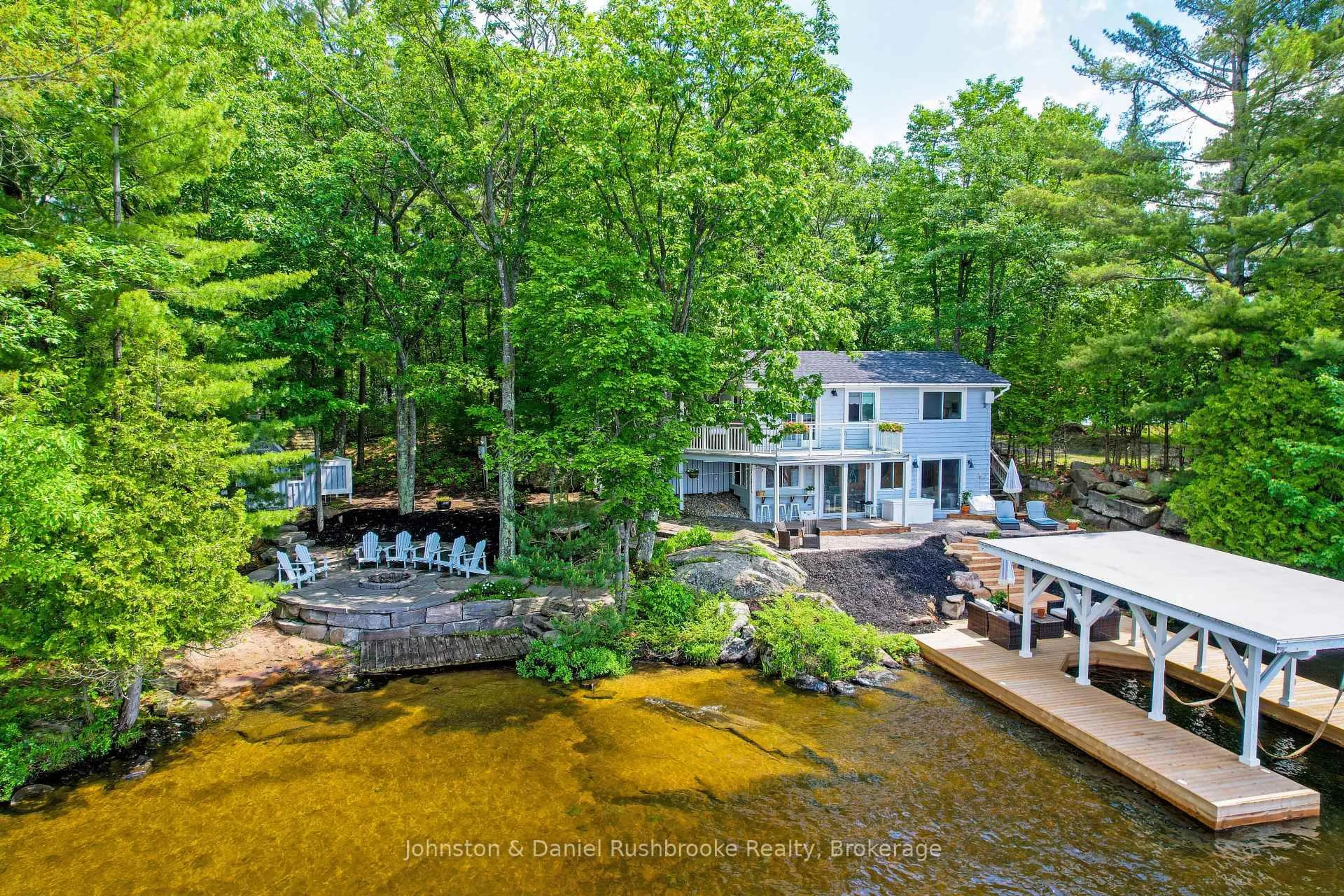 A pic from outside/outdoor area/front of a property/back of a property/a pic from drone, water/lake/river/ocean view for 44-2755 Muskoka Rd 118 West, Muskoka Lakes Ontario P0B 1J0
