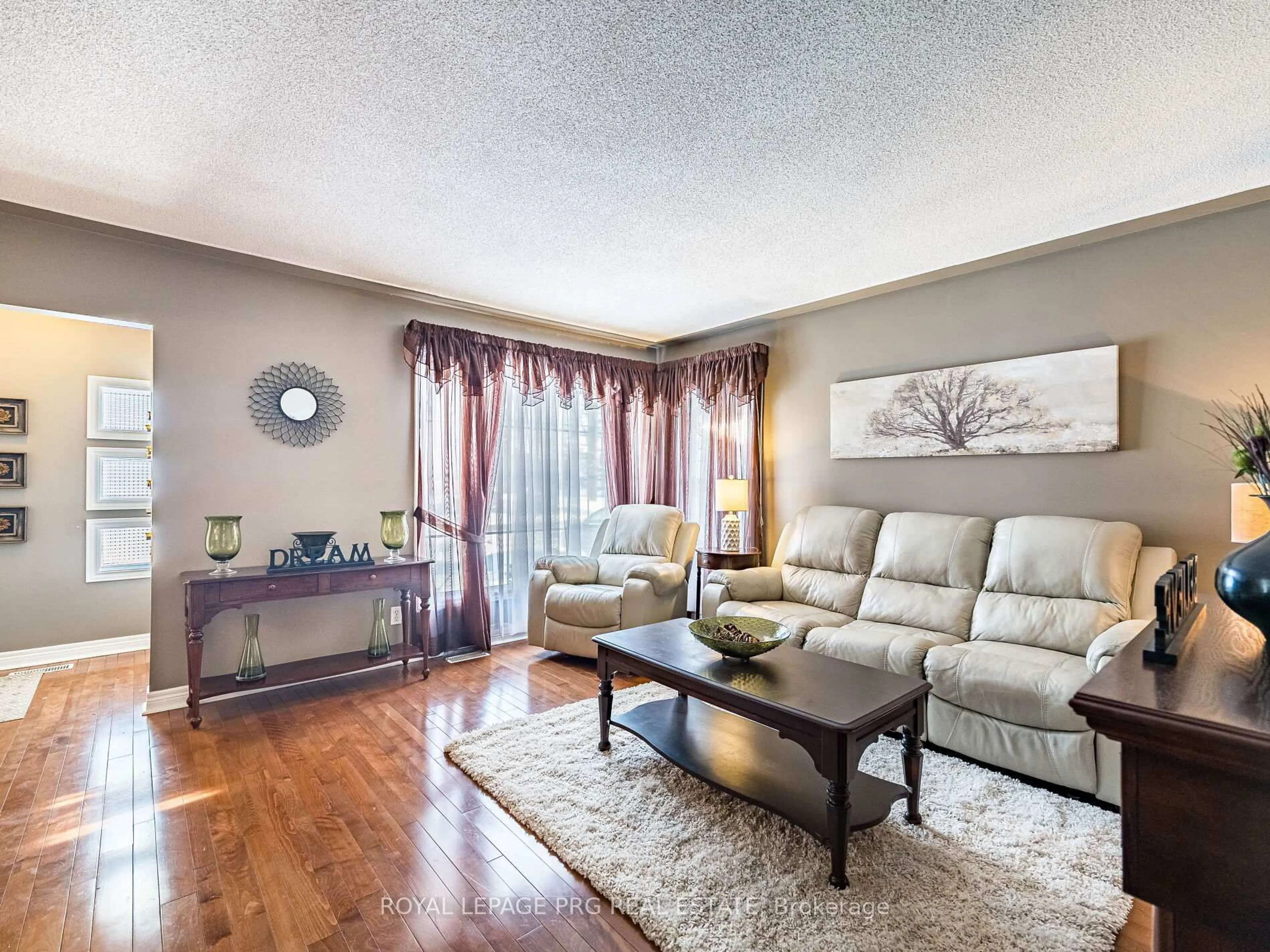 Living room with furniture, wood/laminate floor for 306 Helena St, Haldimand Ontario N1A 2S8