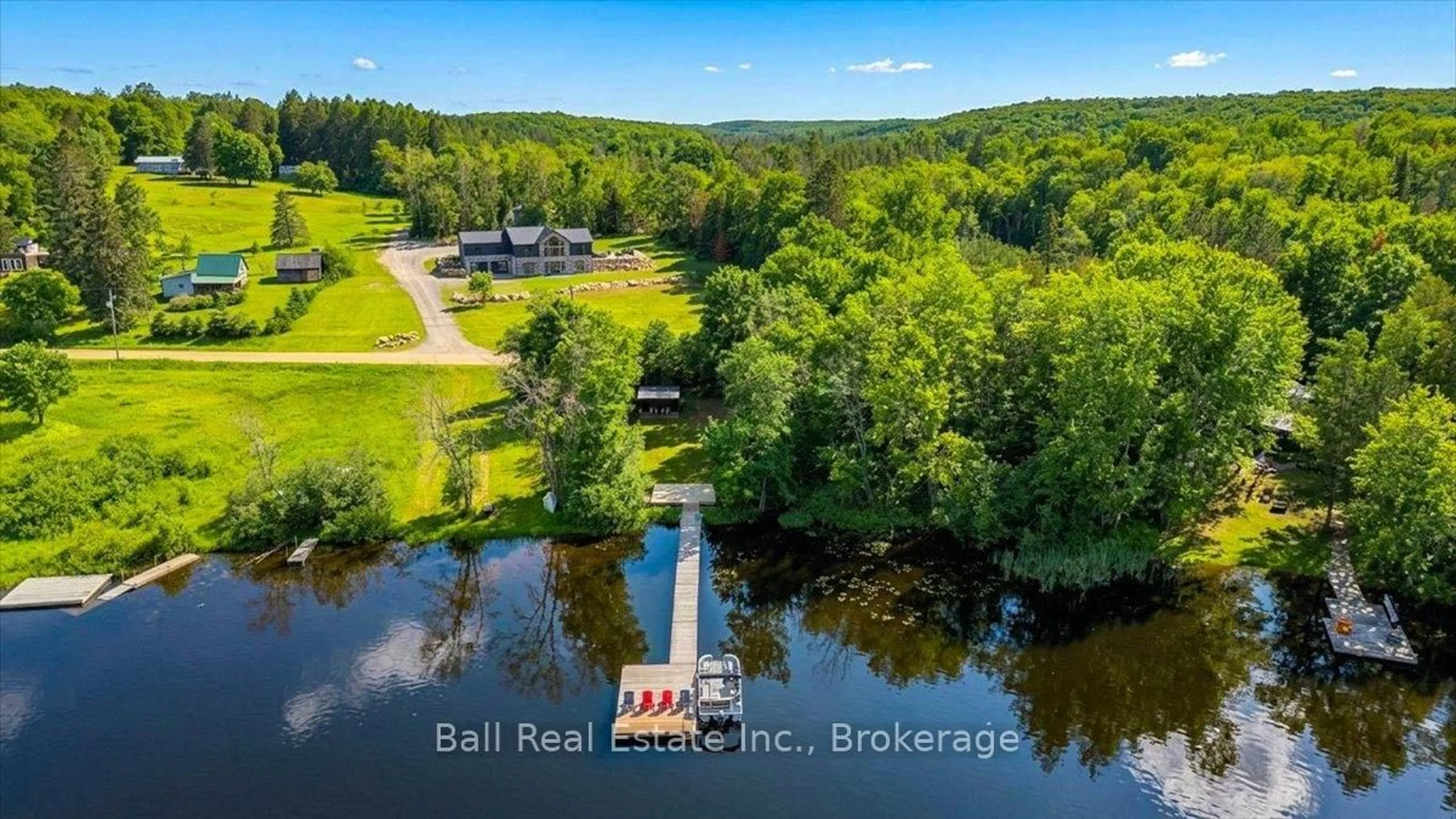 A pic from outside/outdoor area/front of a property/back of a property/a pic from drone, water/lake/river/ocean view for 632 The South Rd, Coe Hill Ontario K0L 1P0