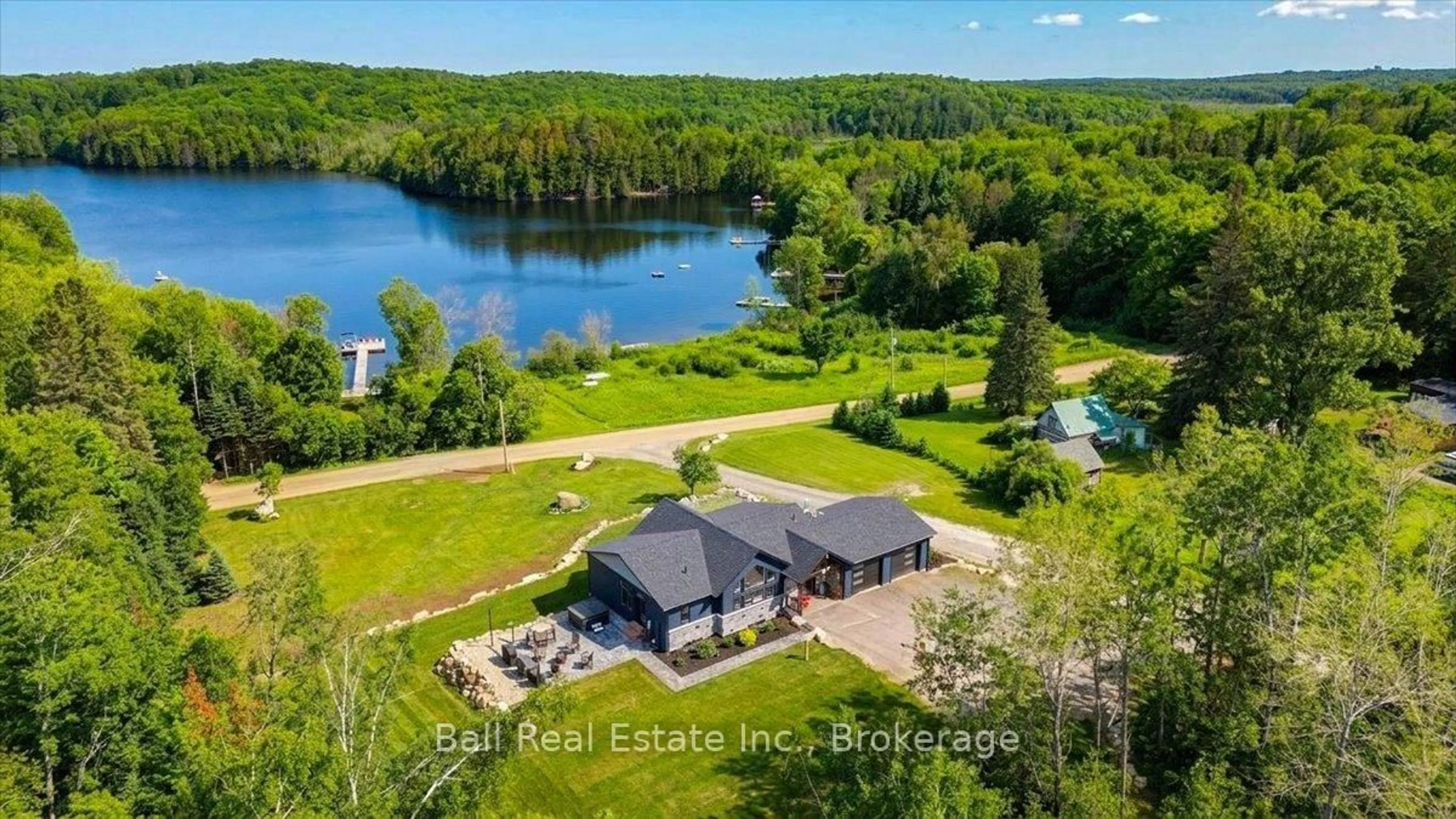 A pic from outside/outdoor area/front of a property/back of a property/a pic from drone, water/lake/river/ocean view for 632 The South Rd, Coe Hill Ontario K0L 1P0