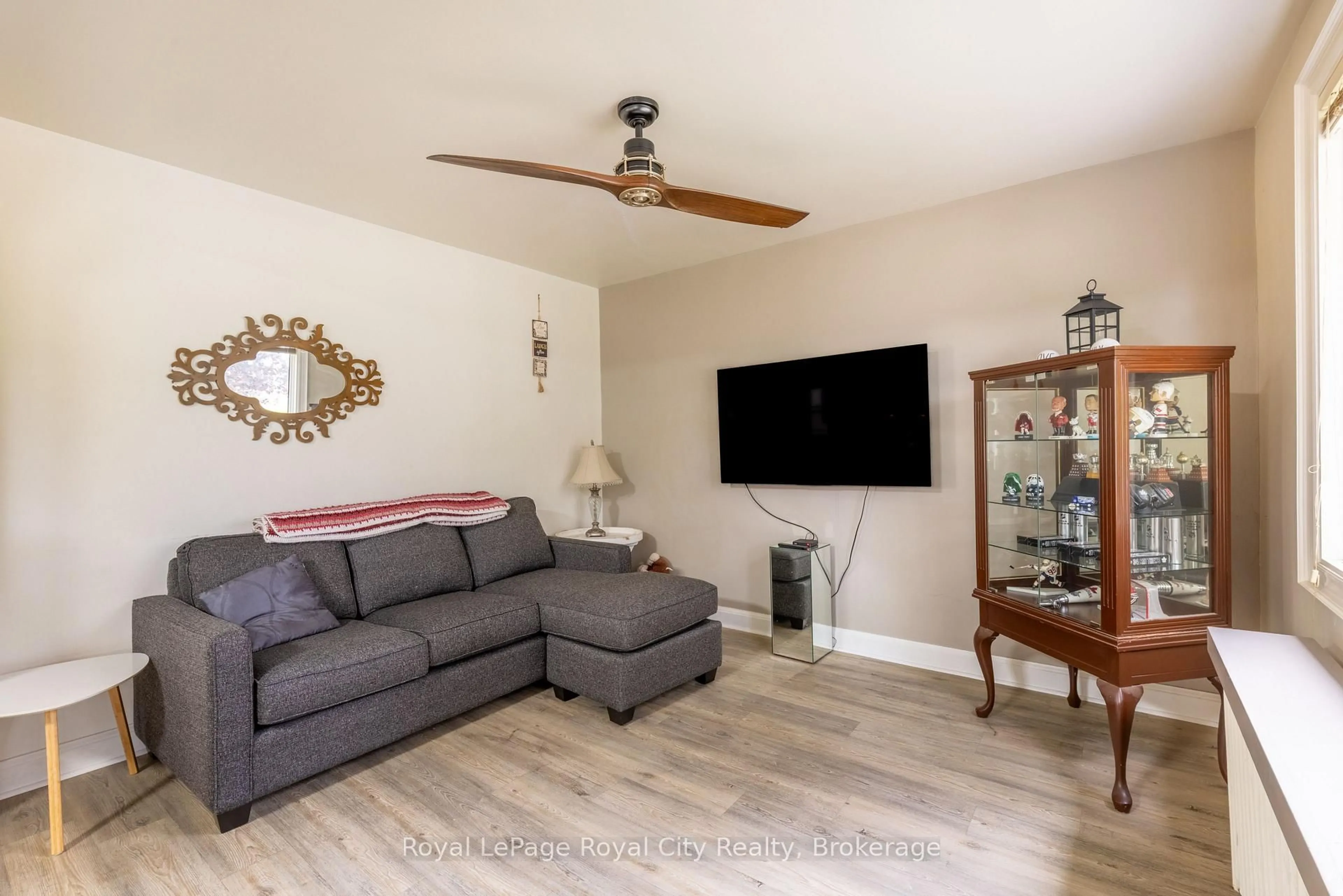 Living room with furniture, wood/laminate floor for 190 Grange St, Guelph Ontario N1E 2W1