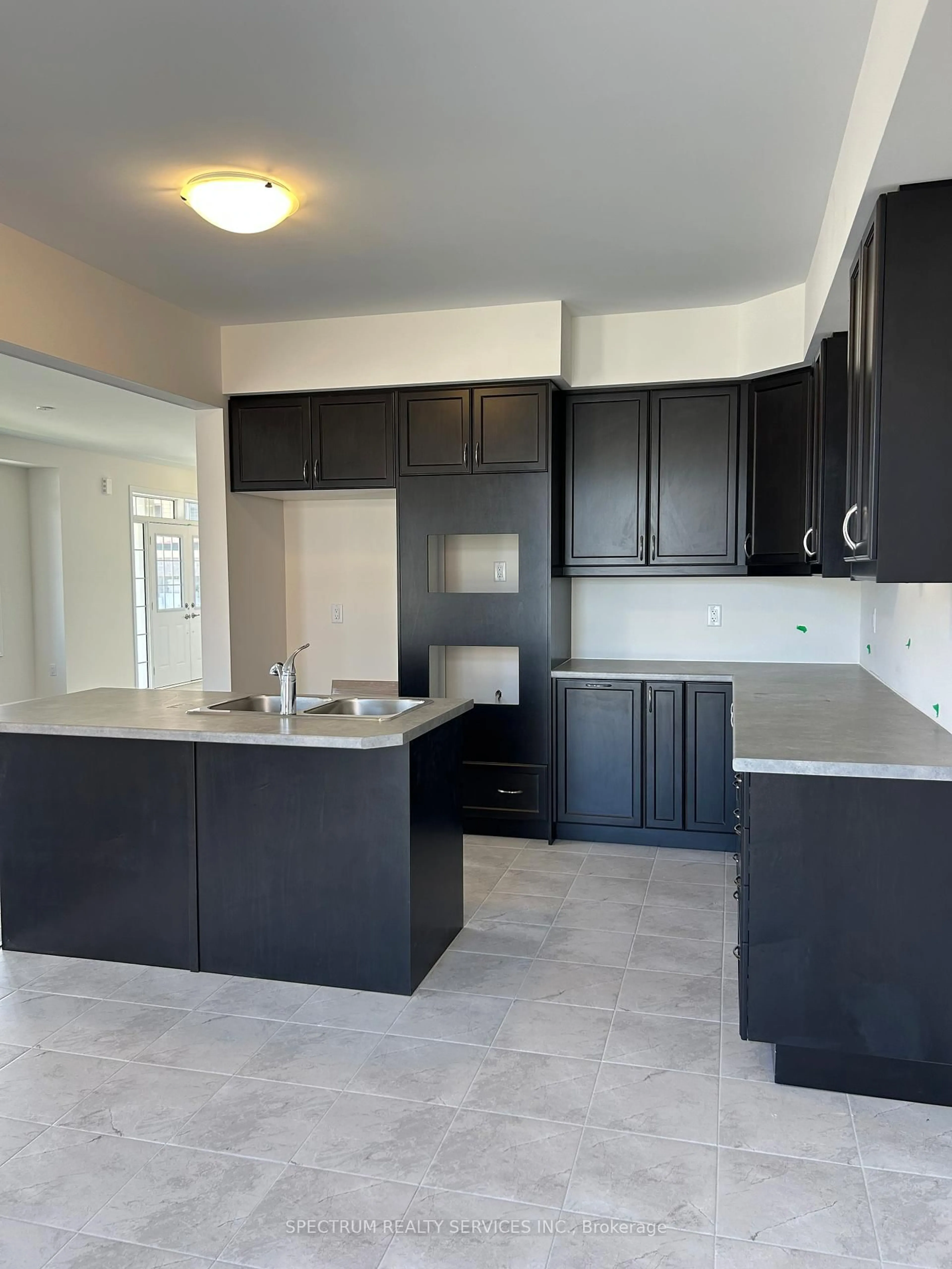 Open concept kitchen, ceramic/tile floor for 42 Waldron St, Brantford Ontario N3V 0C3