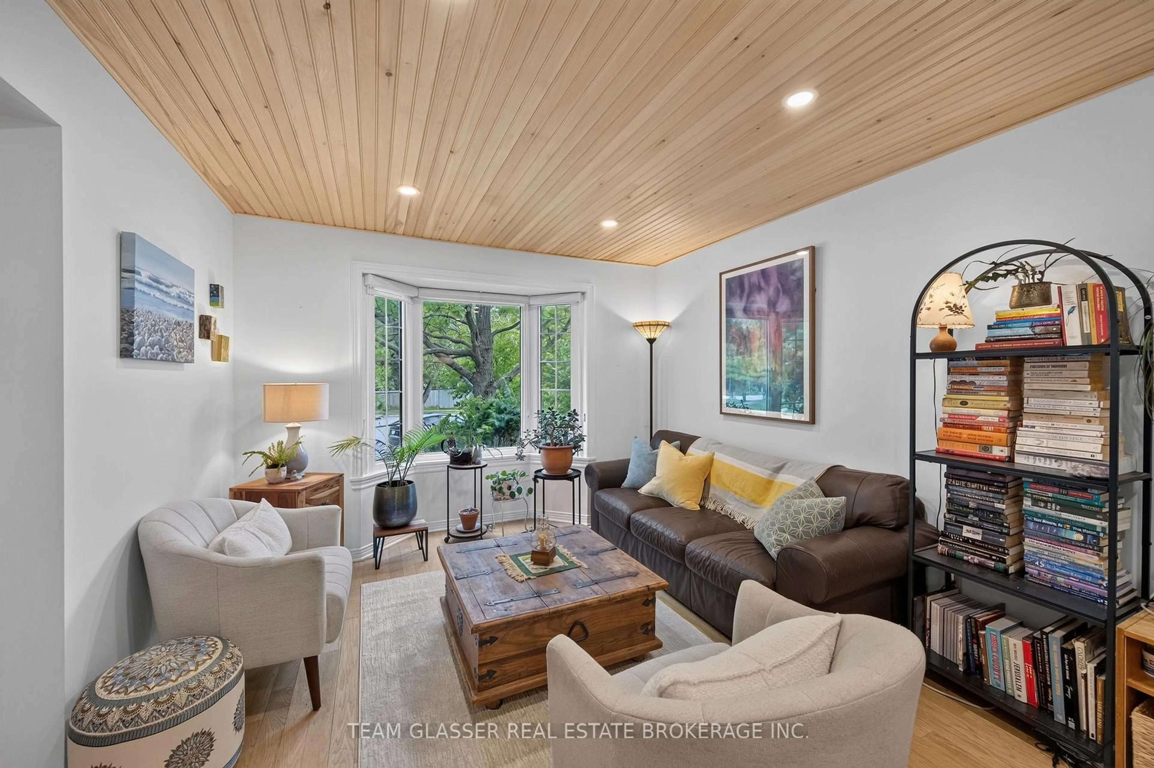 Living room with furniture, wood/laminate floor for 1642 ATTAWANDARON Rd, London North Ontario N6G 3M6