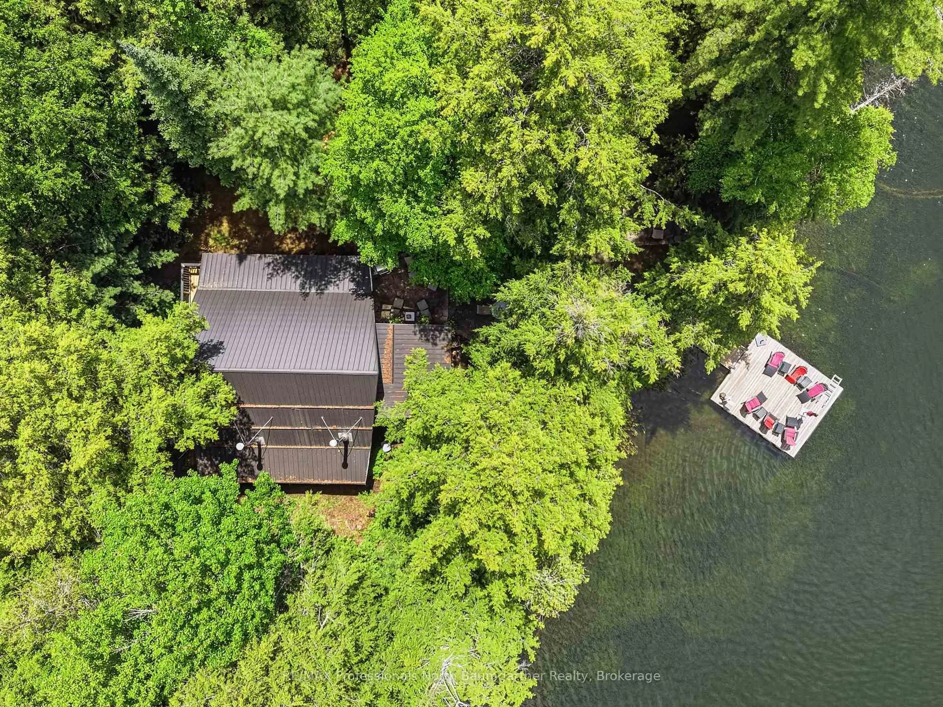 A pic from outside/outdoor area/front of a property/back of a property/a pic from drone, water/lake/river/ocean view for 1036 Barnum Lake Dr, Dysart et al Ontario K0M 1S0
