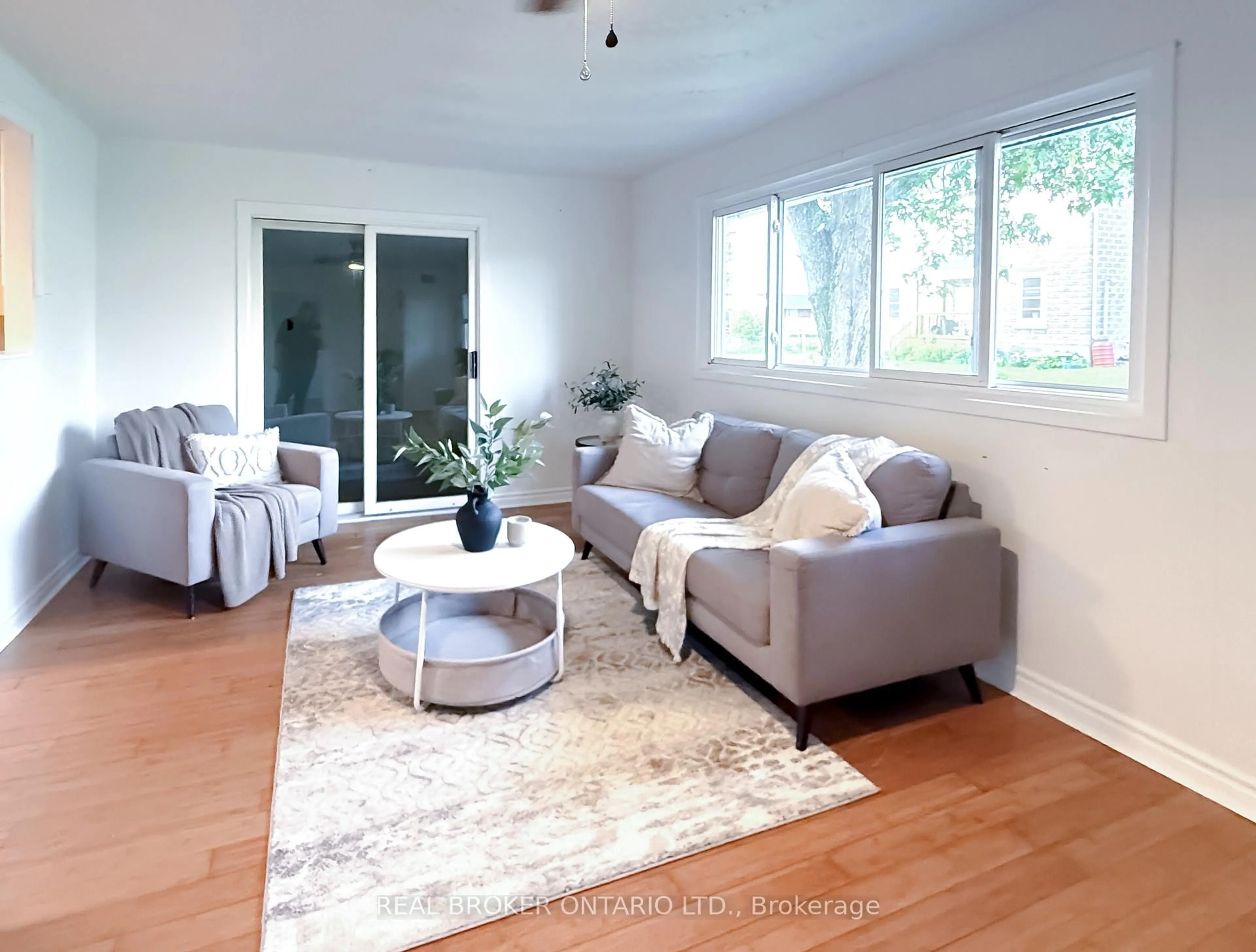 Living room with furniture, wood/laminate floor for 348 County 16 Rd, Elizabethtown-Kitley Ontario K0G 1G0
